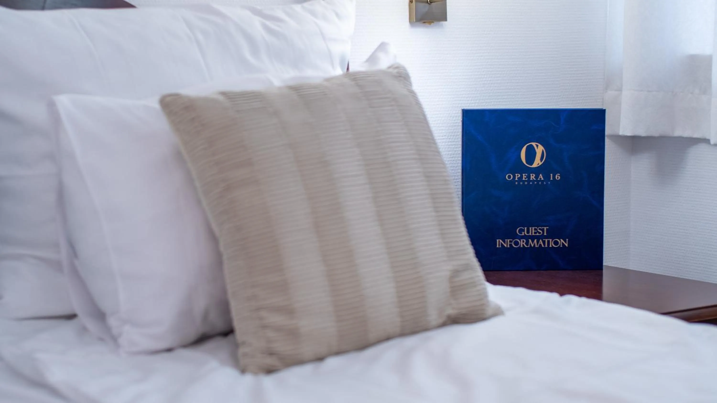 Bed in OPERA16 Guestrooms