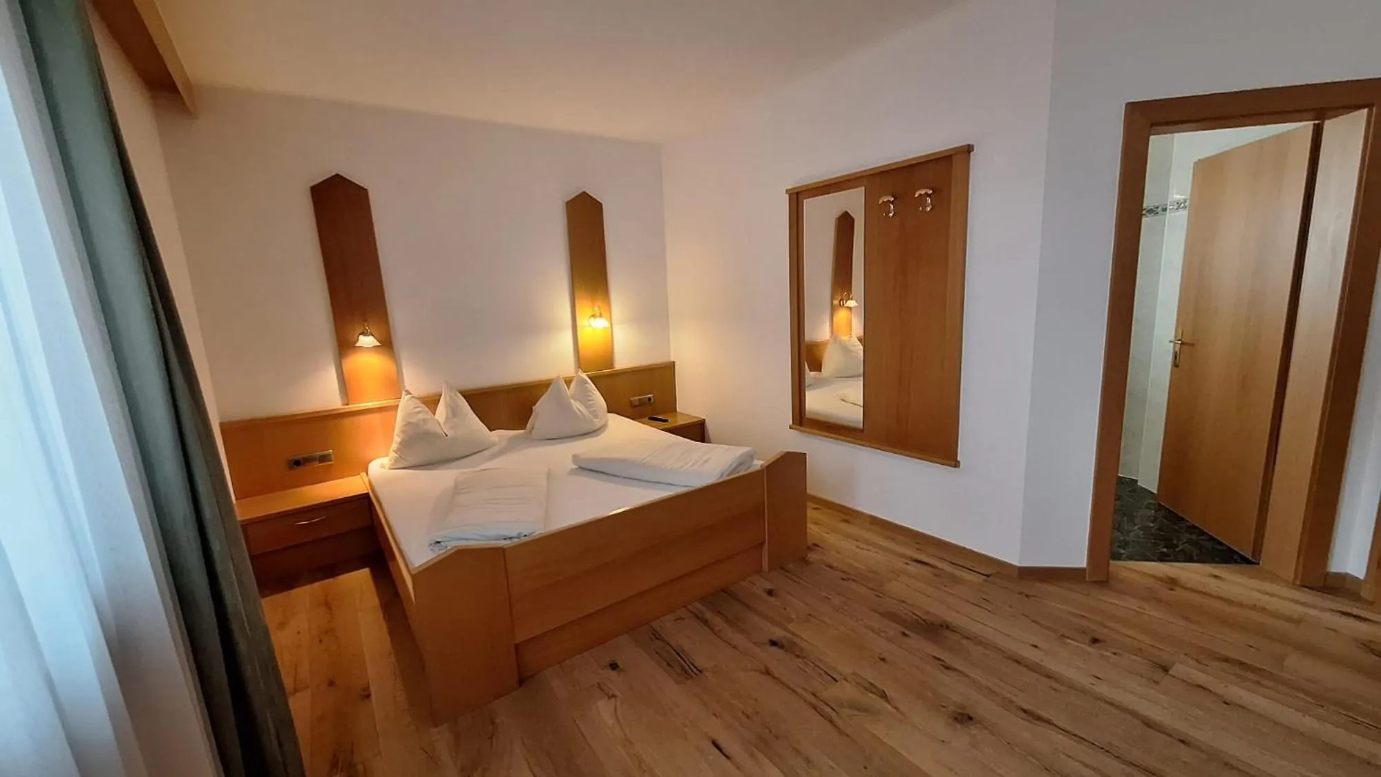 Bed in Alpenspitz Appartements - Garni - B&B