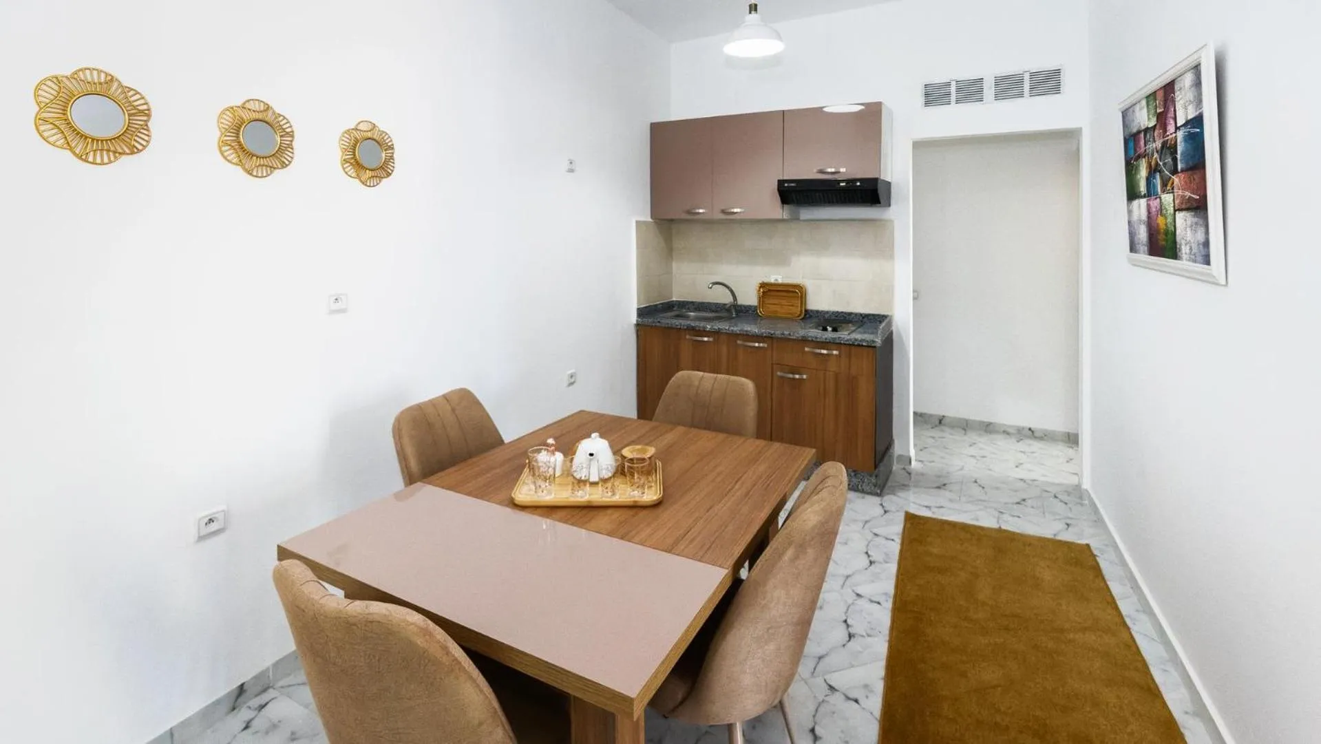 Kitchen or kitchenette in Sables D'or Appart Hôtel