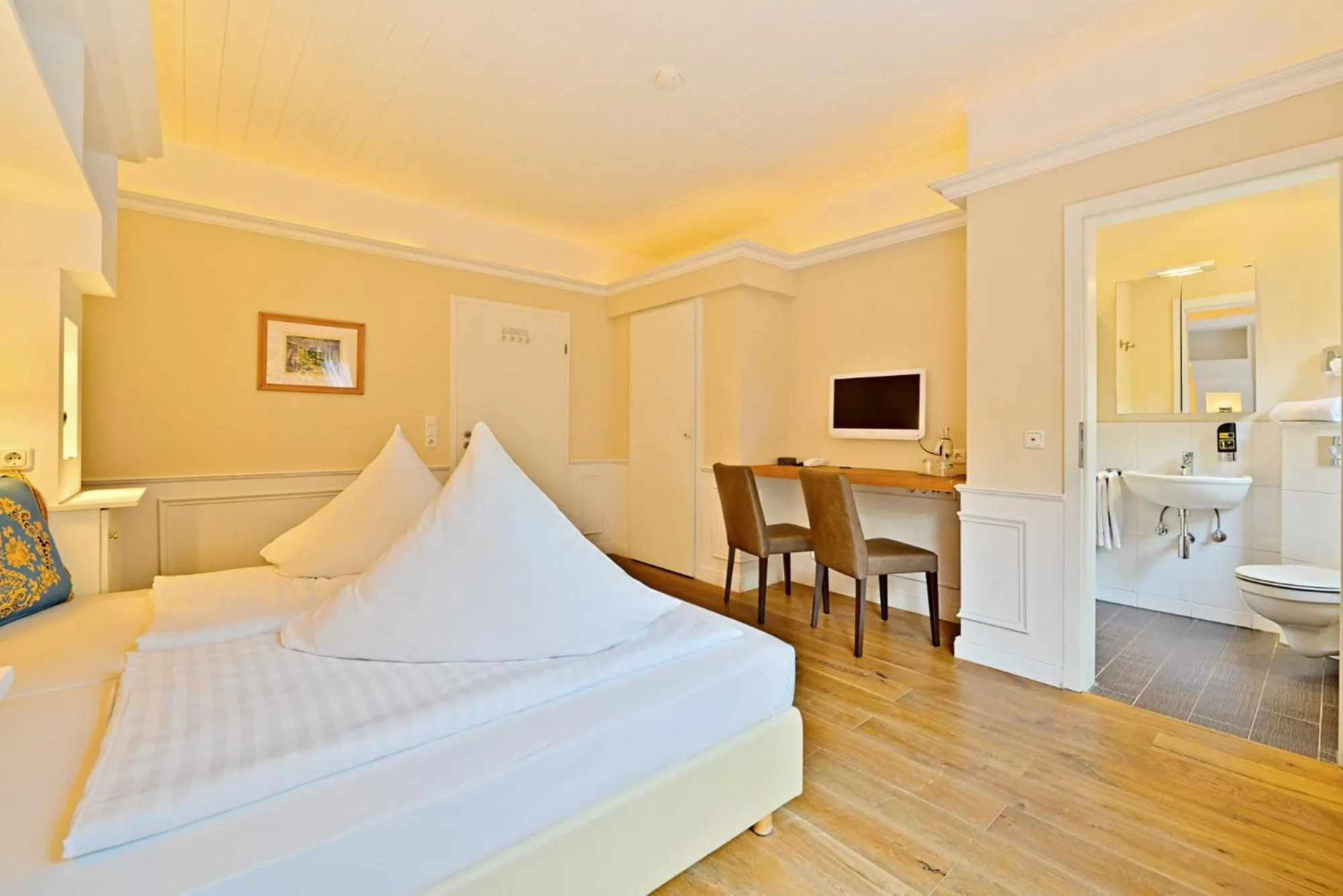 Bed in Hotel Weinberg-Schlößchen