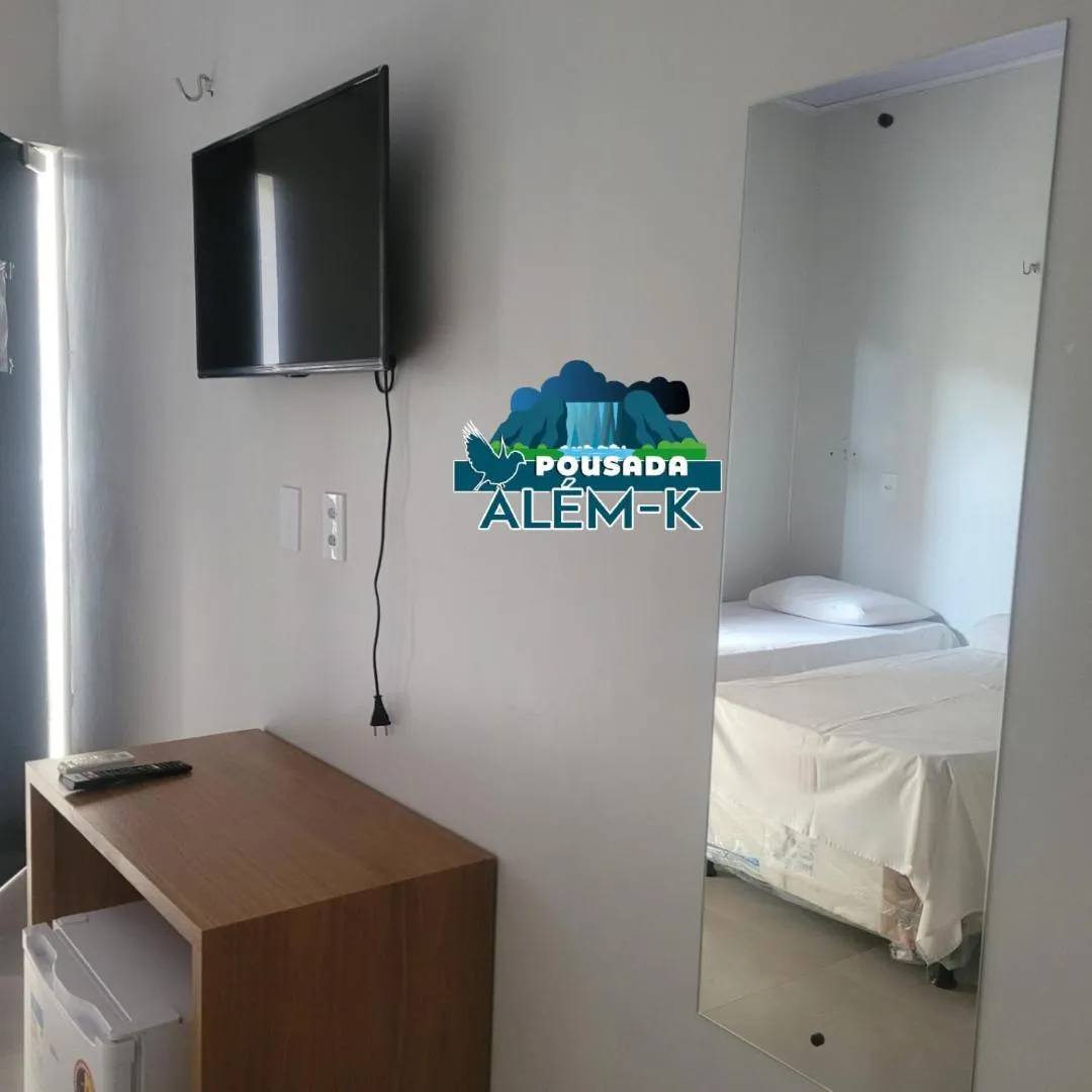 Bed in POUSADA ALÉM-K