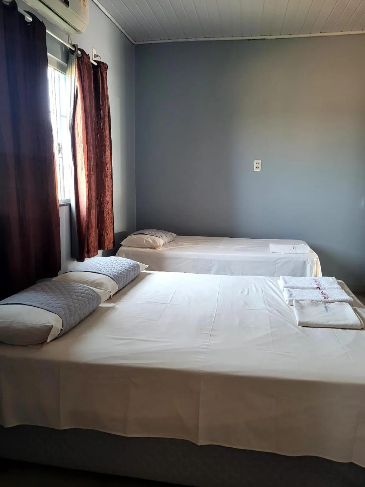 Bed in POUSADA ALÉM-K