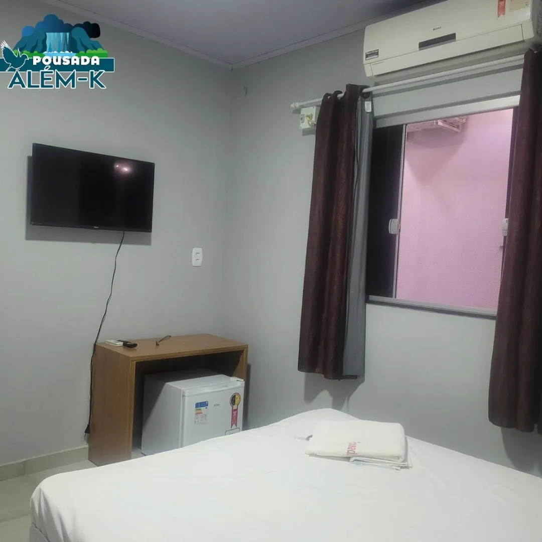 Bed in POUSADA ALÉM-K