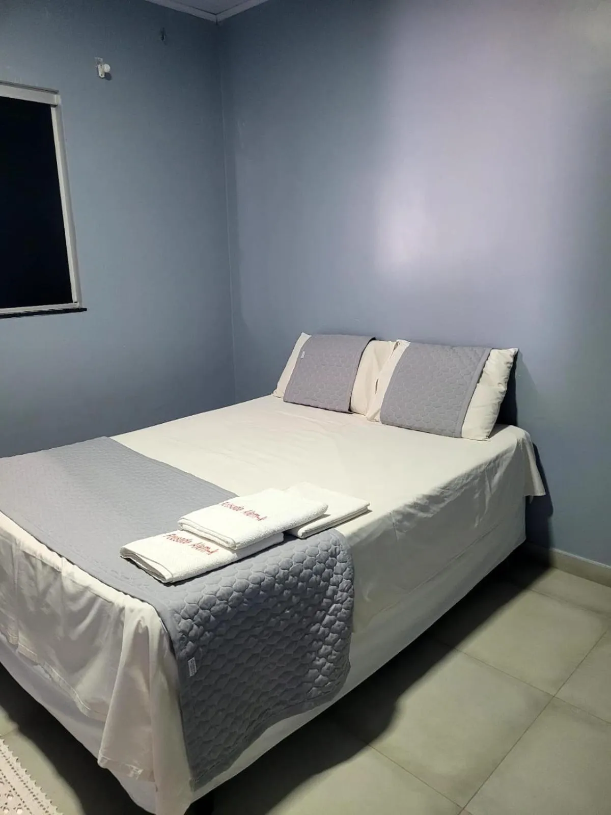 Bed in POUSADA ALÉM-K