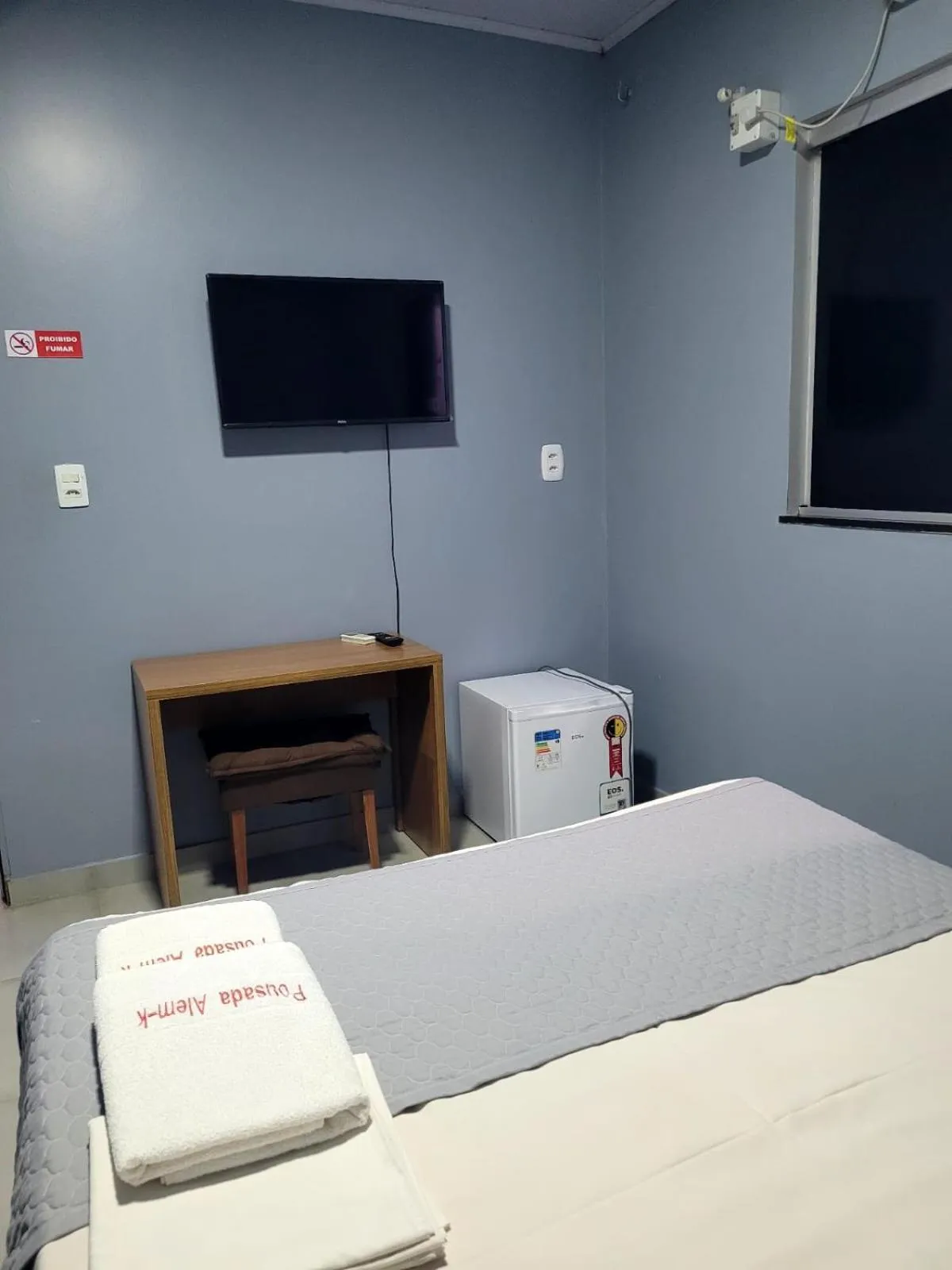 Bed in POUSADA ALÉM-K