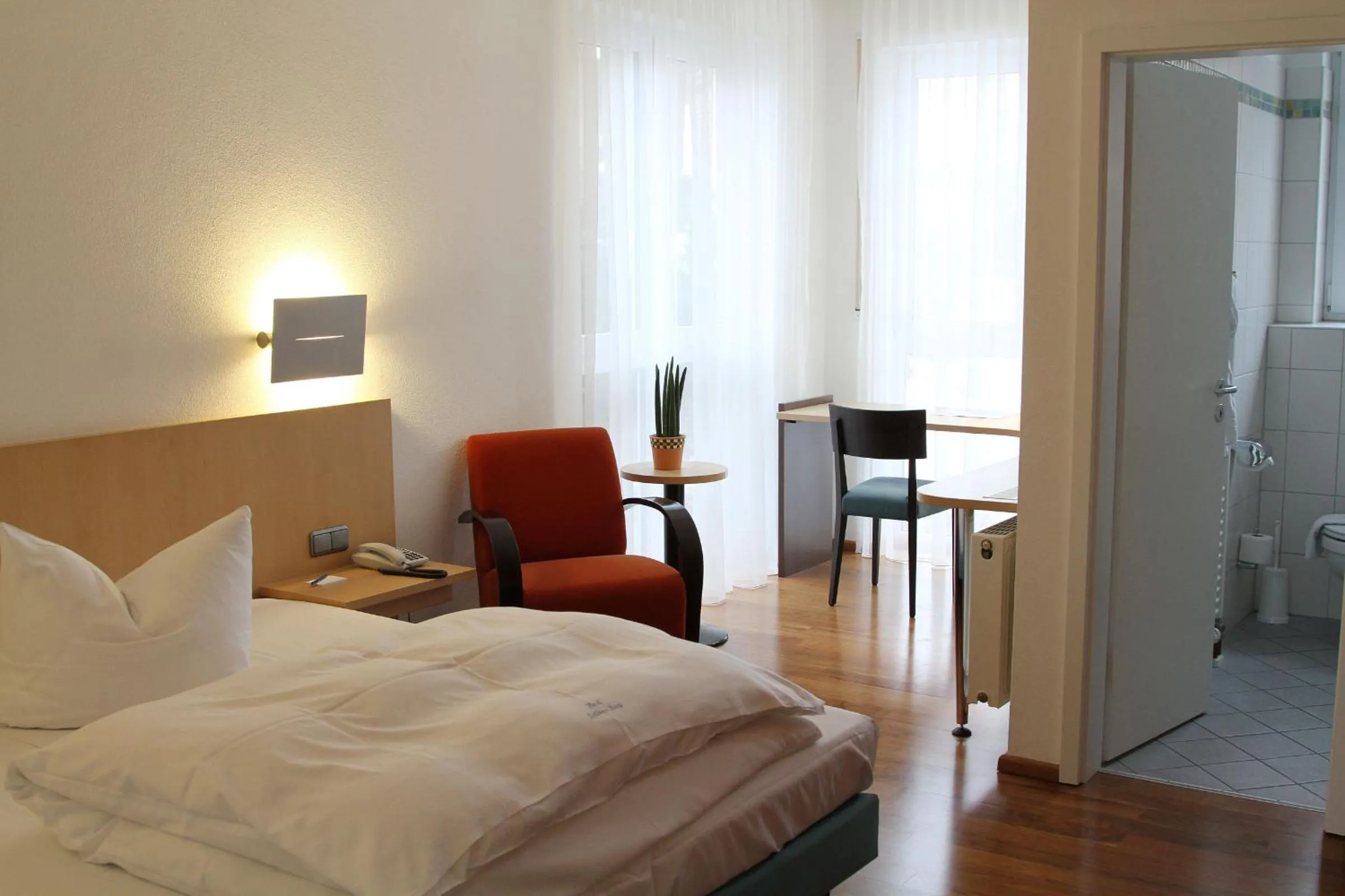 Photo of the whole room, Bed in Hotel Schloss Berg