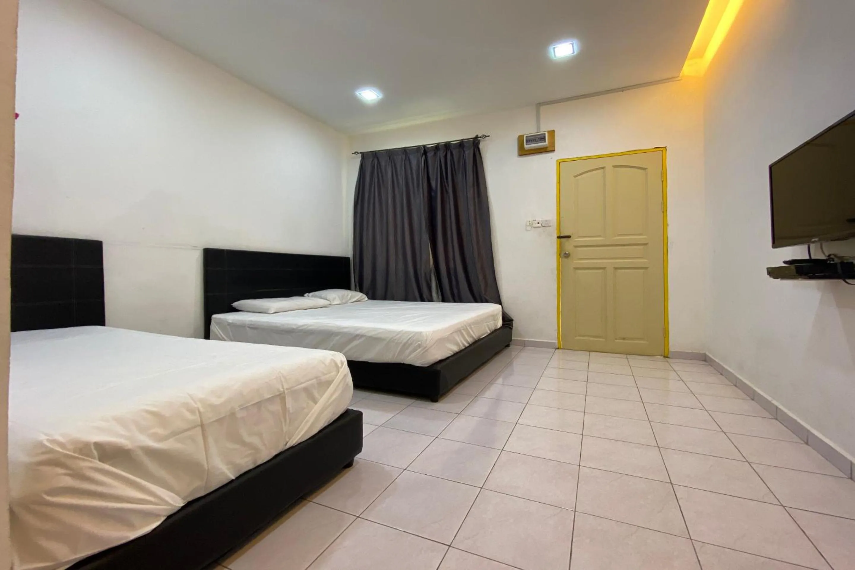 Bedroom, Bed in Hotel O Taman Kota Homestay