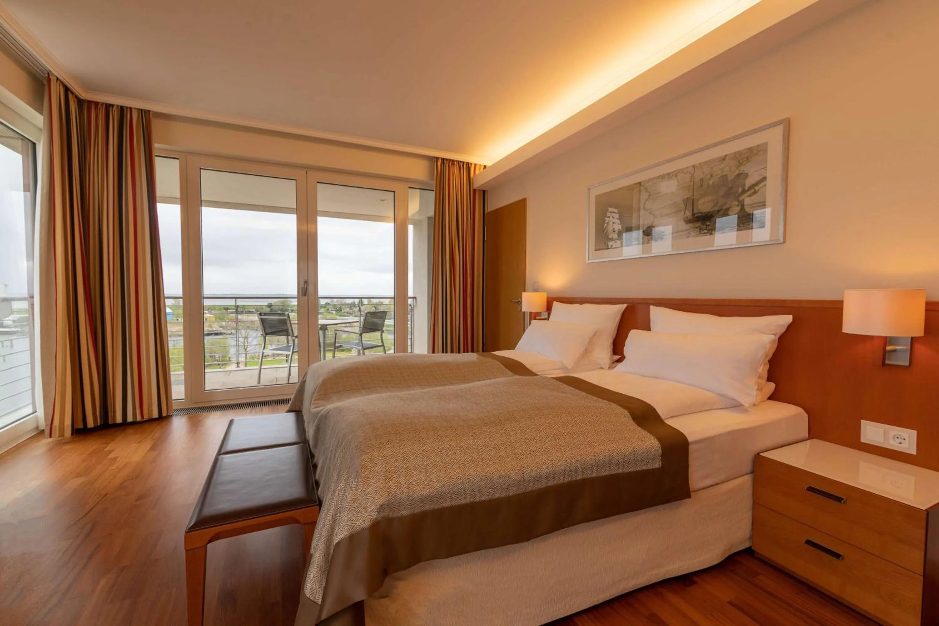 Photo of the whole room, Bed in ATLANTIC Hotel Wilhelmshaven