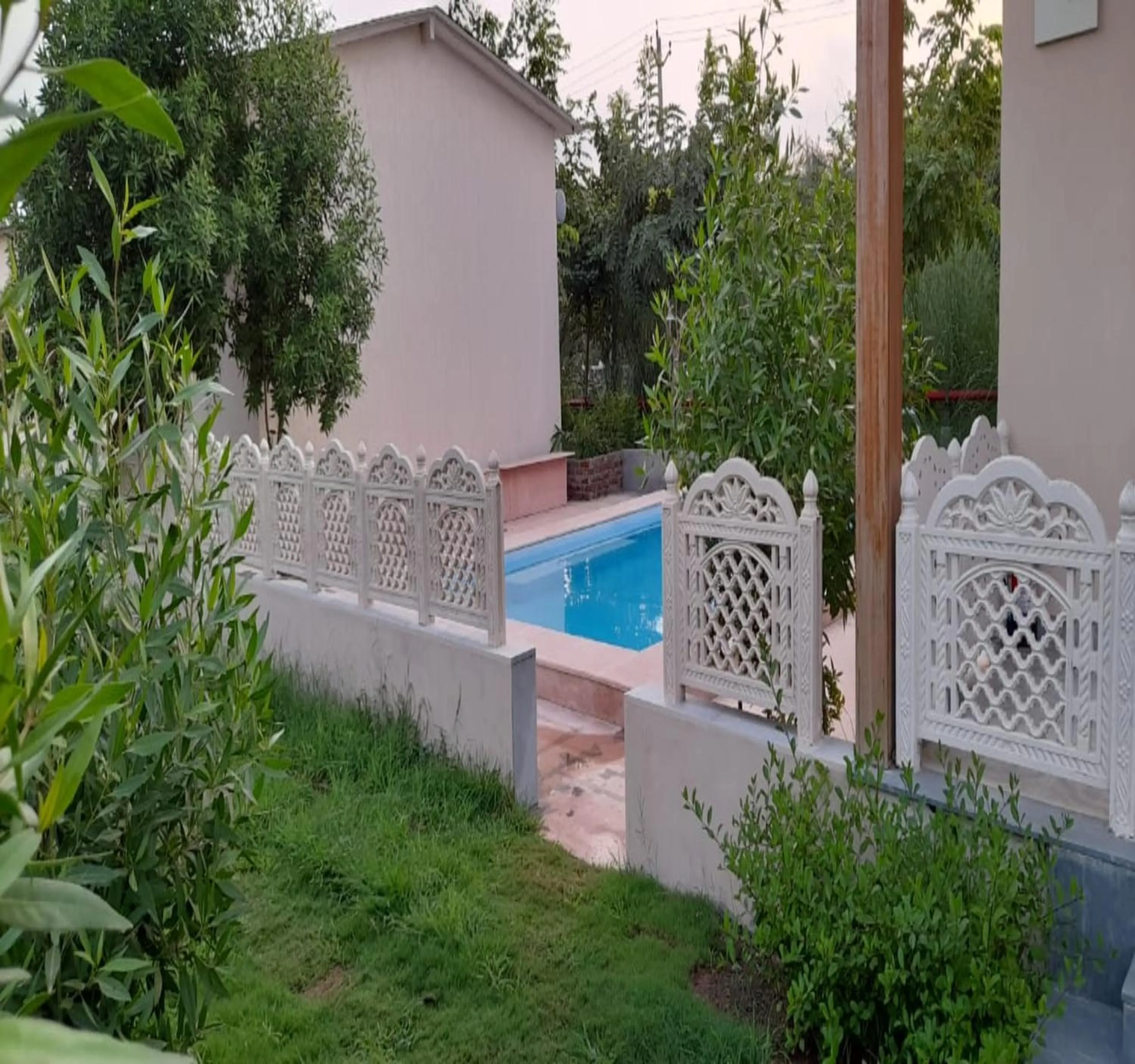Swimming pool in WelcomHeritage Cheetahgarh Resort & Spa