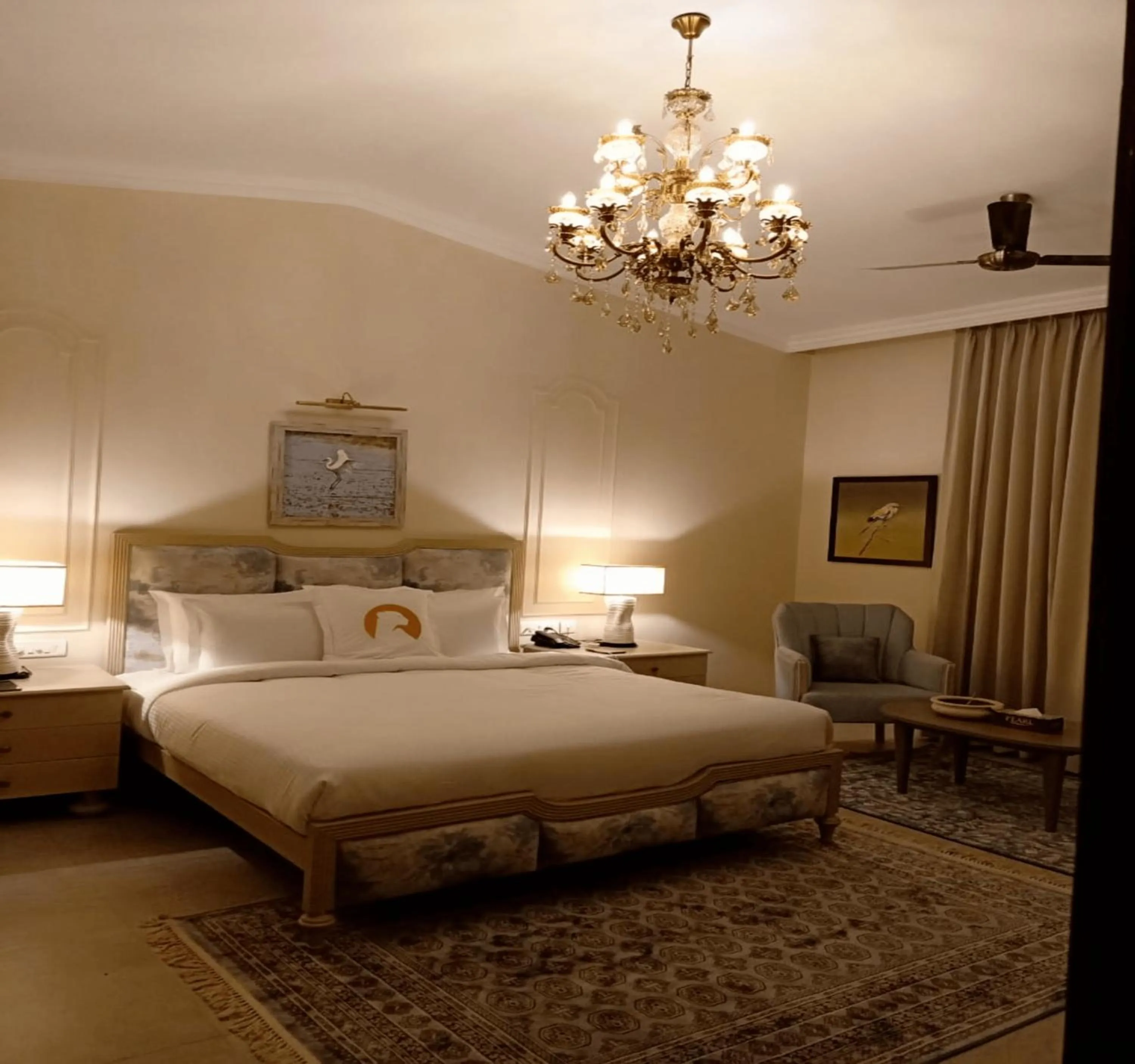 Bed in WelcomHeritage Cheetahgarh Resort & Spa