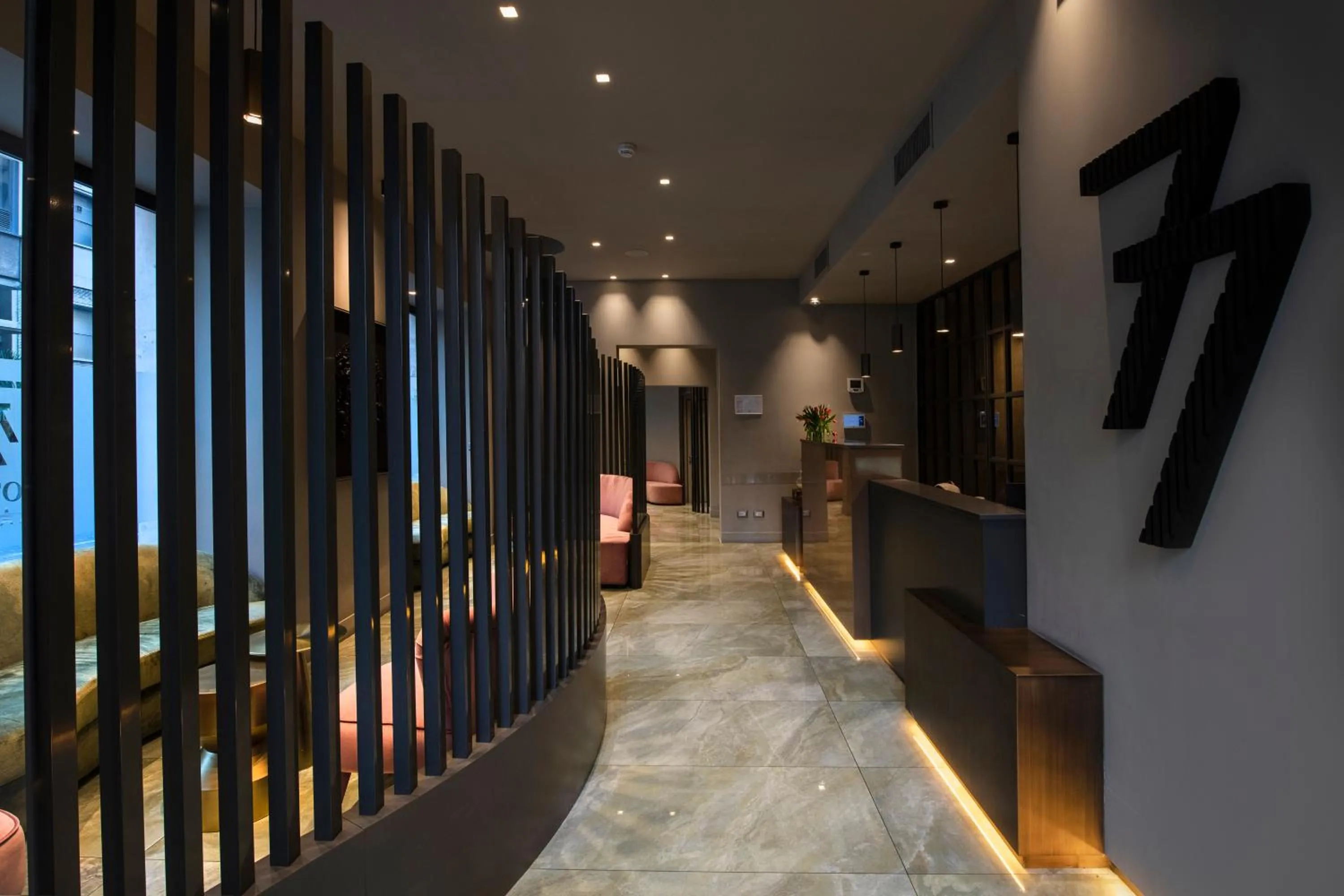 Communal lounge/ TV room in Hotel 77 Seventy-Seven - Maison D'Art Collection