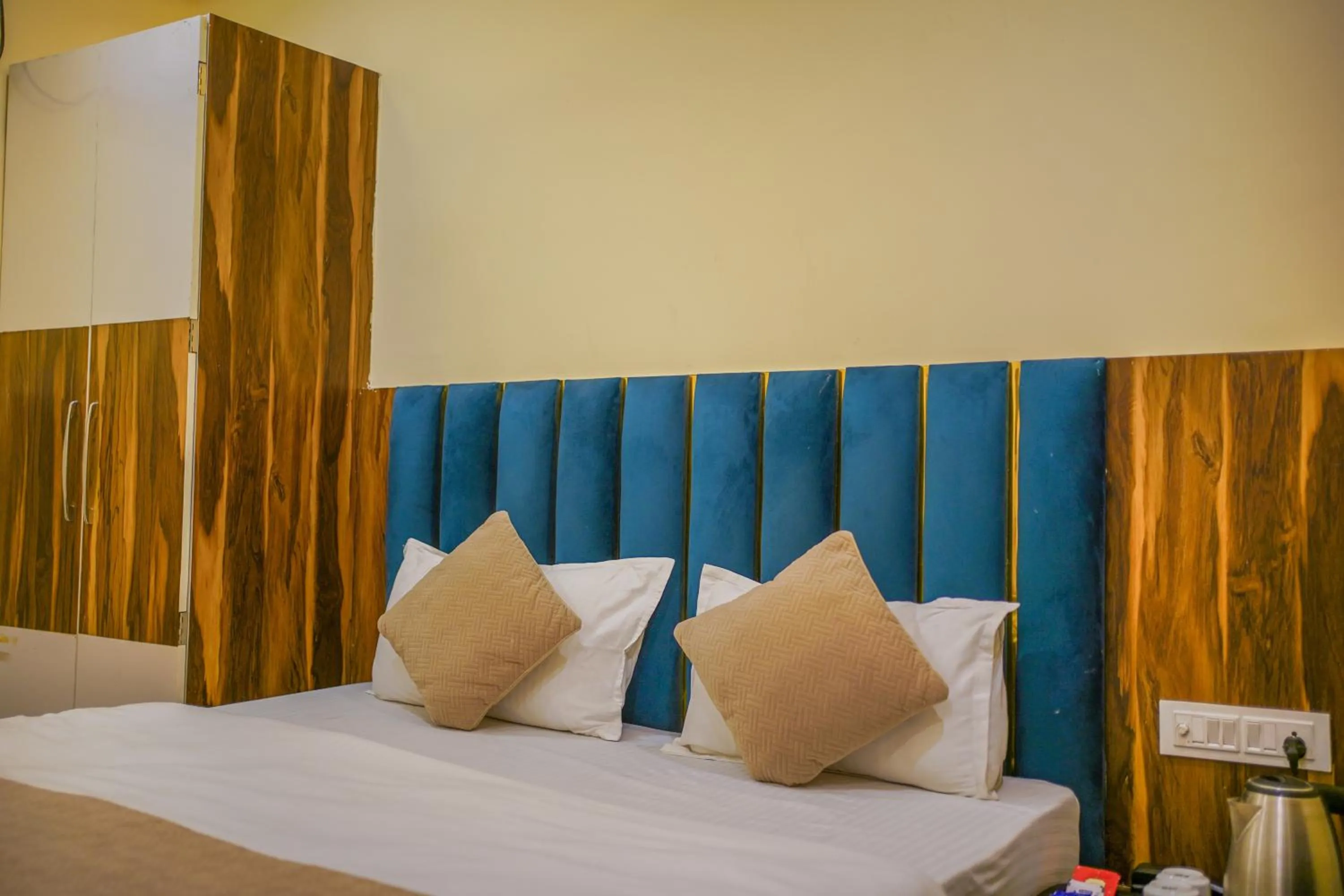 Bed in HOTEL AUGUSTO