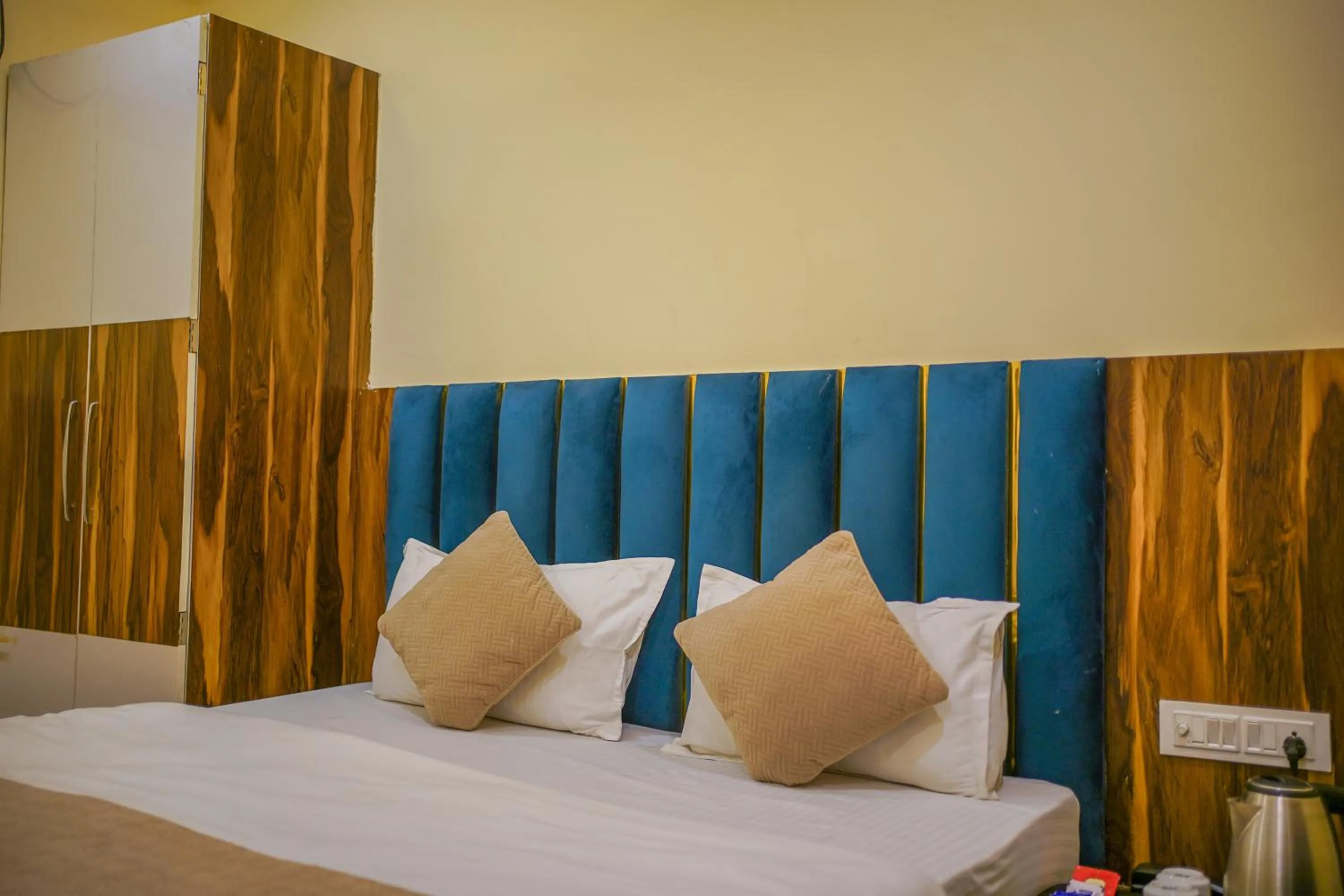 Bed in HOTEL AUGUSTO