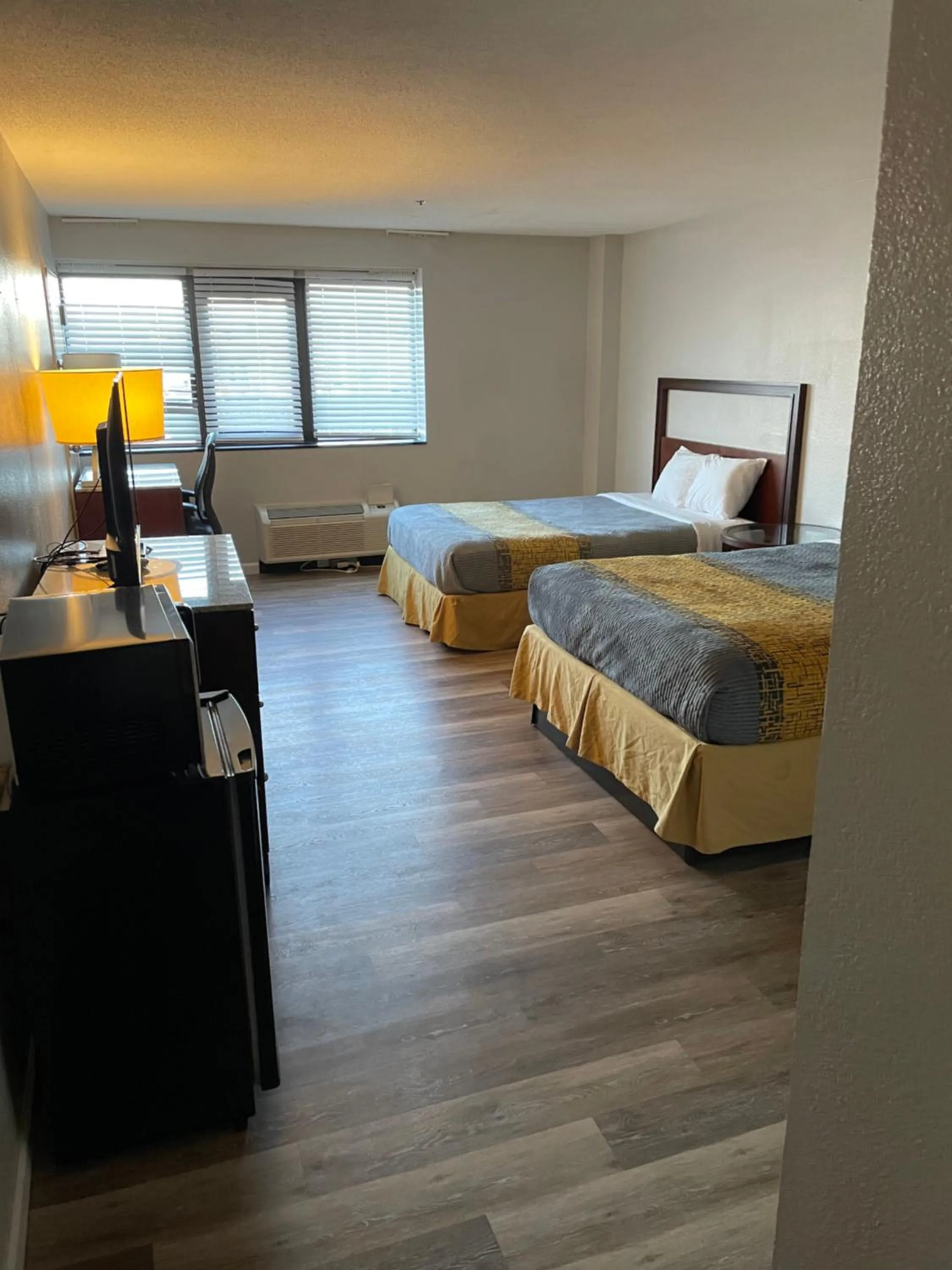 Bed in Apm Inn & Suites