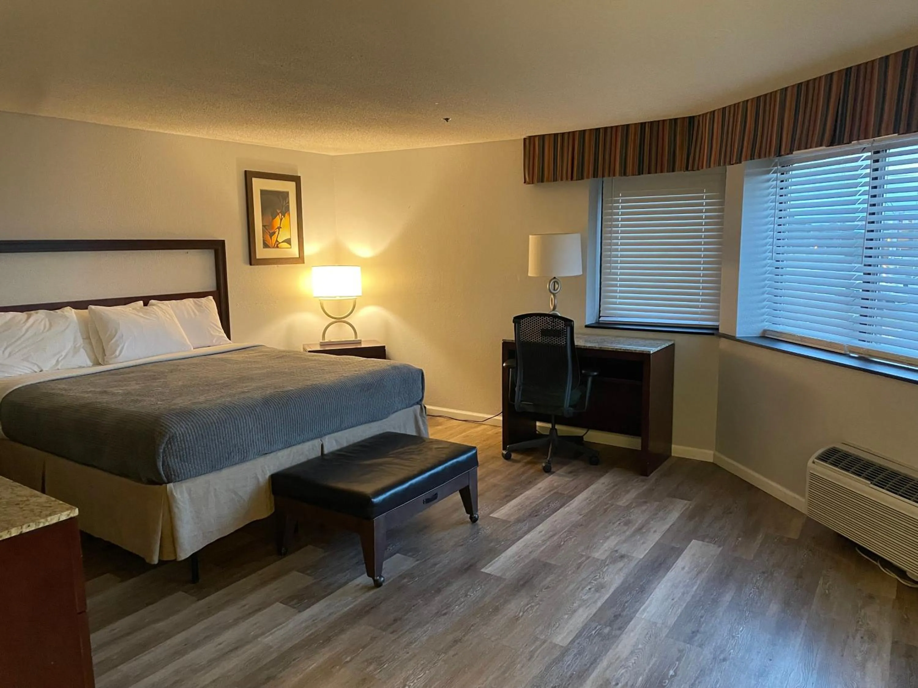 Bed in Apm Inn & Suites