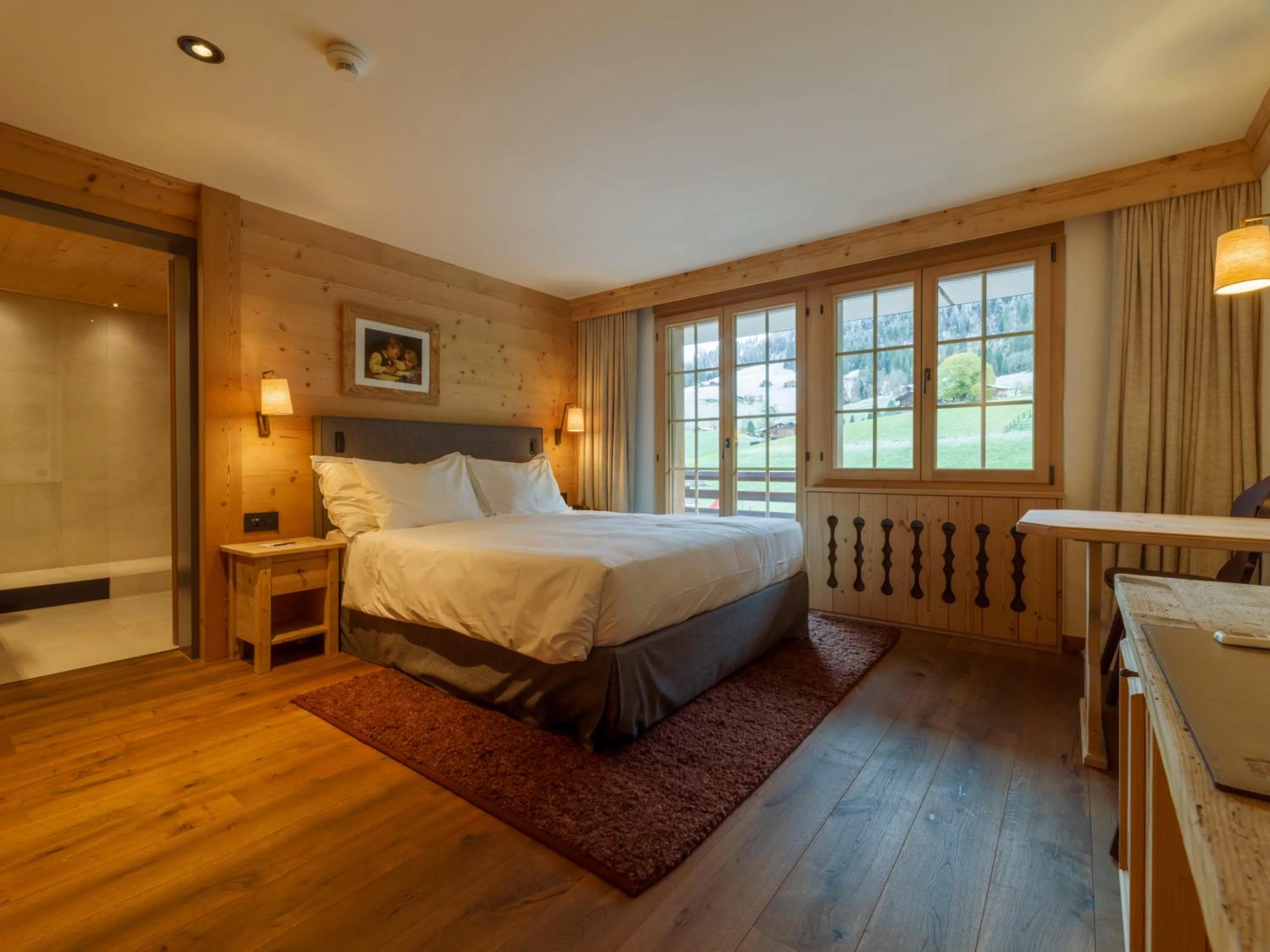 Bed in Hotel Le Grand Chalet Gstaad