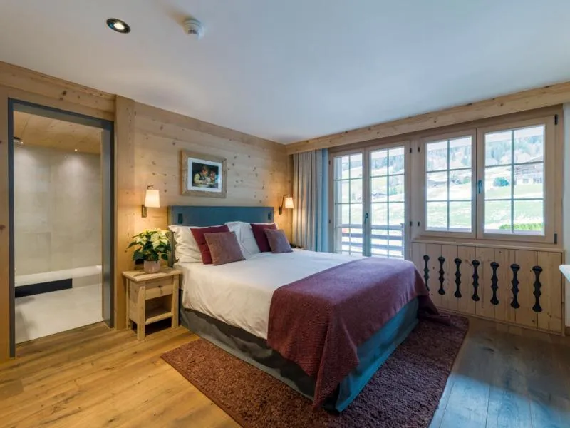 Bed in Hotel Le Grand Chalet Gstaad