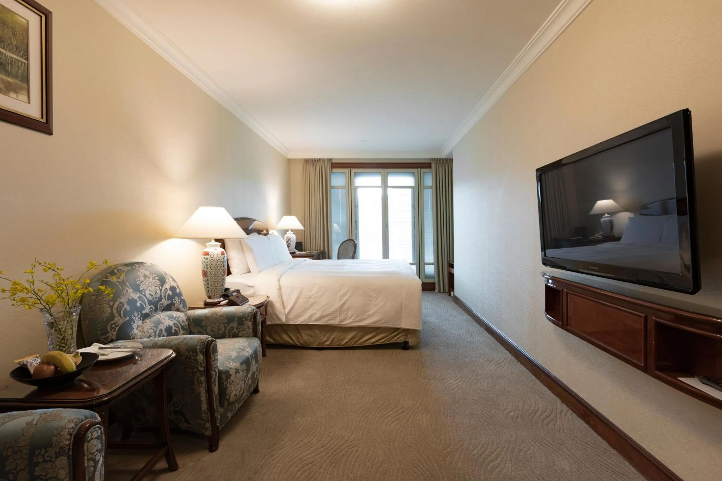 Bed in Evergreen Laurel Hotel Taipei