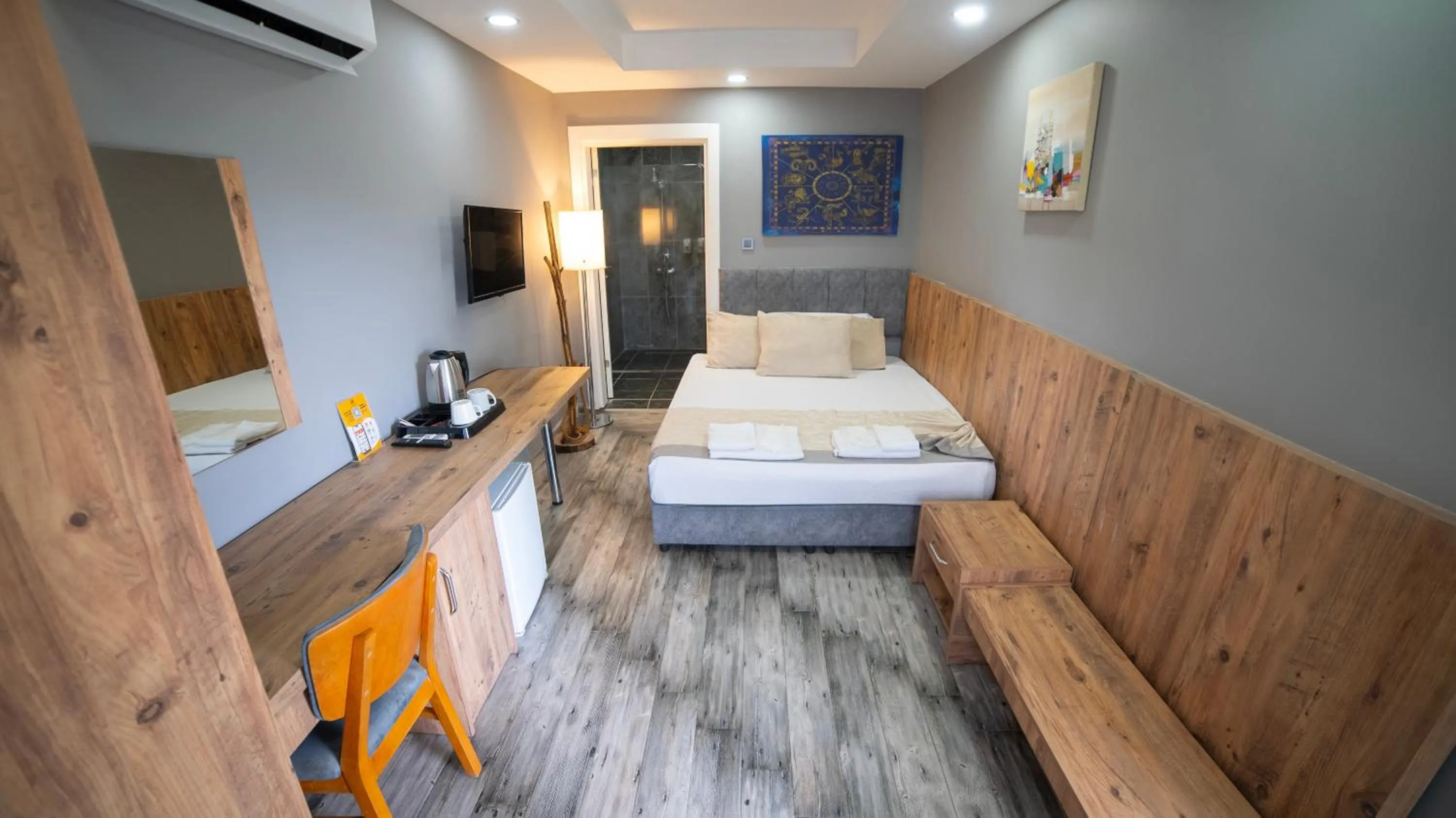 Bed in La Cactus Boutique Hotel