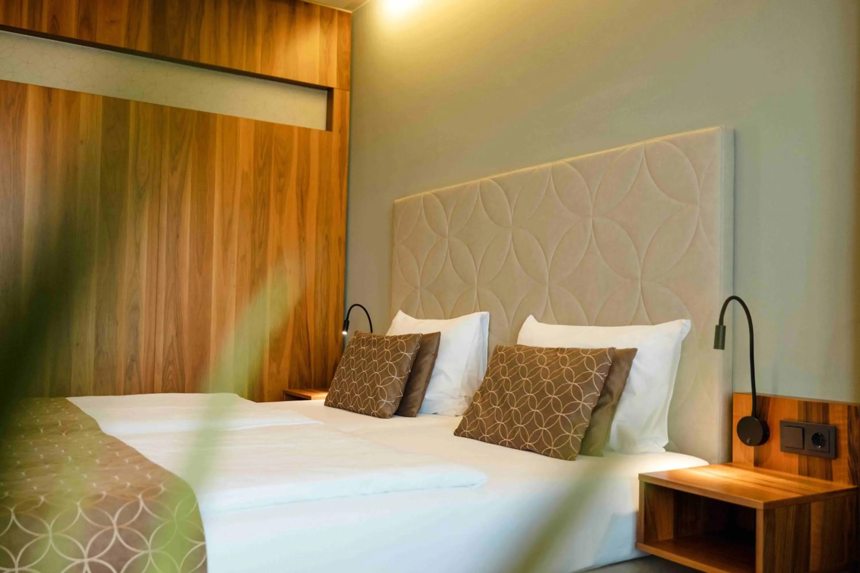 Bed in Therme Laa Hotel Silent Spa Villas