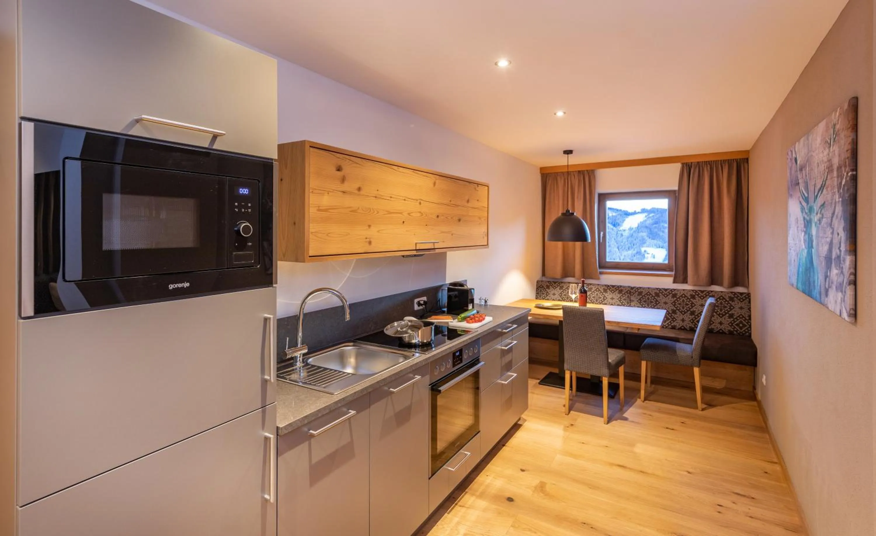 Kitchen or kitchenette in Das Grünholz Aparthotel