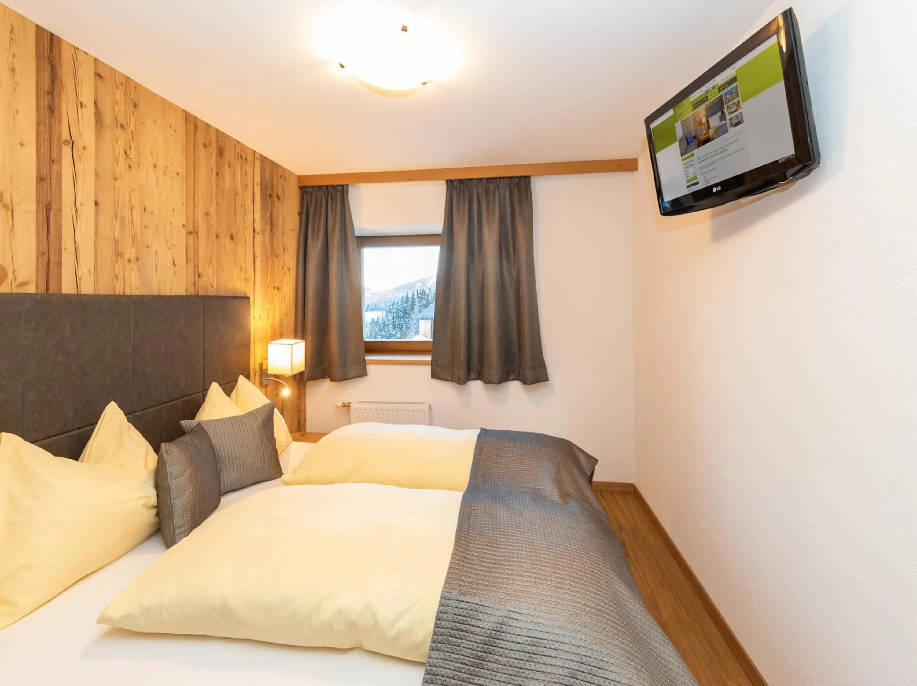 Bed in Das Grünholz Aparthotel