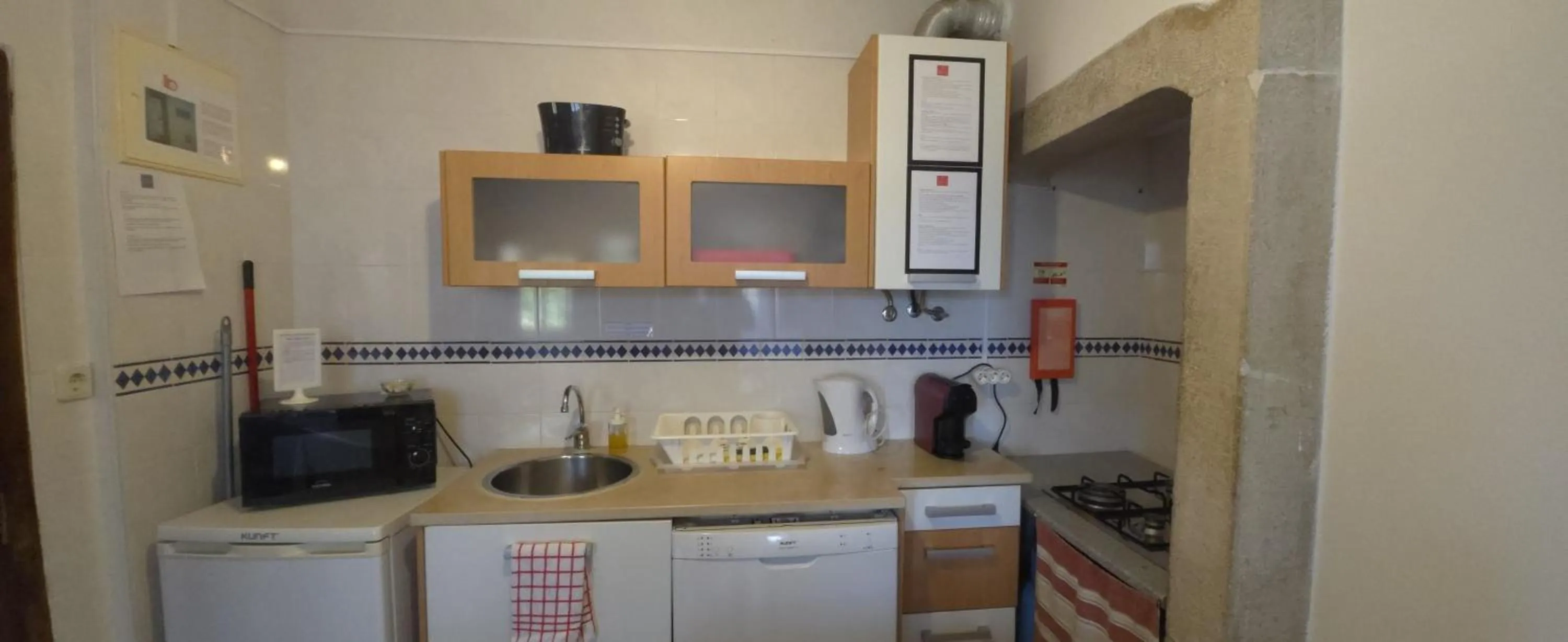 Kitchen or kitchenette in Casas da Biquinha