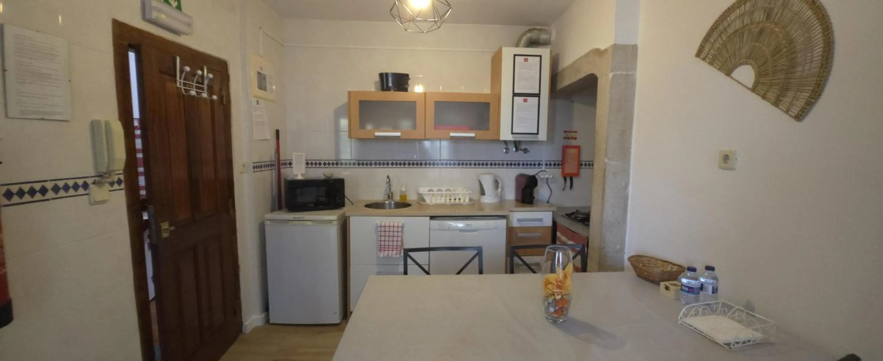 Kitchen or kitchenette in Casas da Biquinha