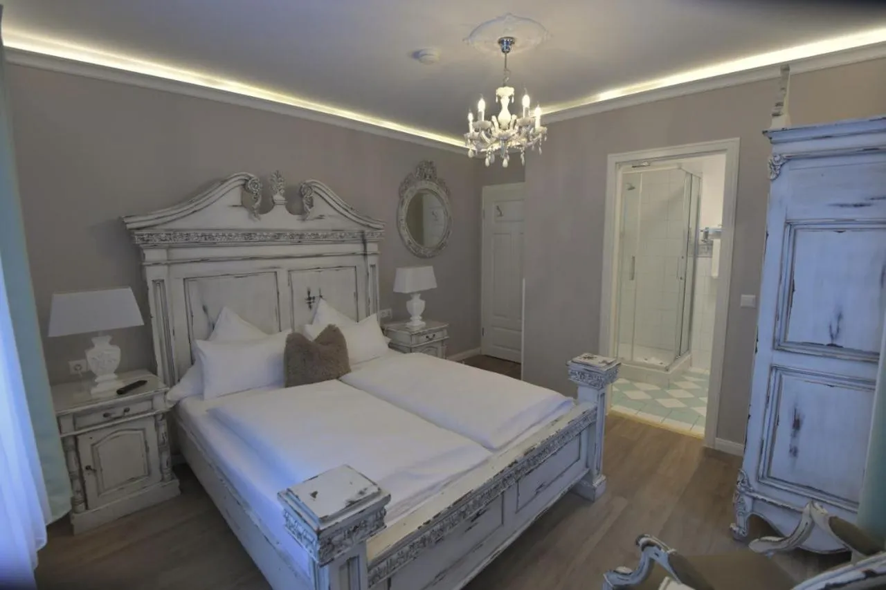 Photo of the whole room, Bed in Boutiquehotel Villa Rosenhof