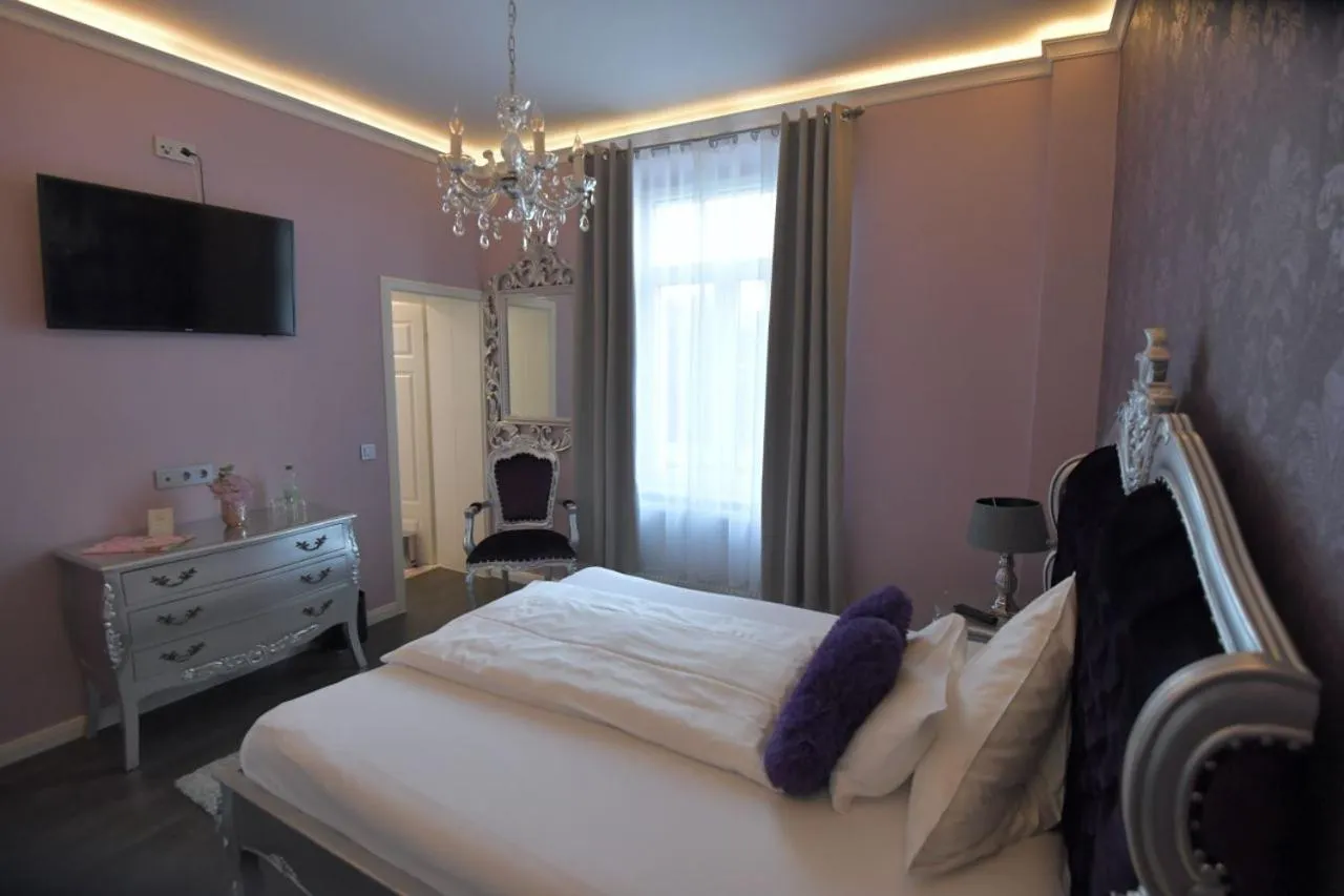 Photo of the whole room, Bed in Boutiquehotel Villa Rosenhof