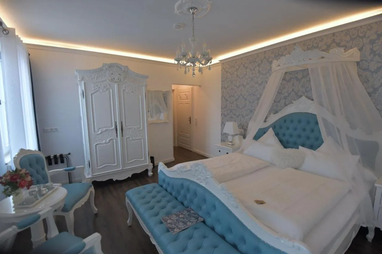 Photo of the whole room, Bed in Boutiquehotel Villa Rosenhof