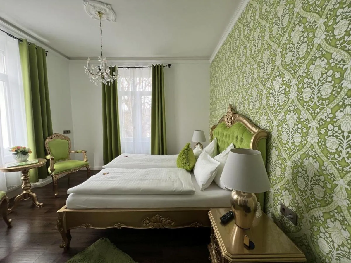 Photo of the whole room, Bed in Boutiquehotel Villa Rosenhof