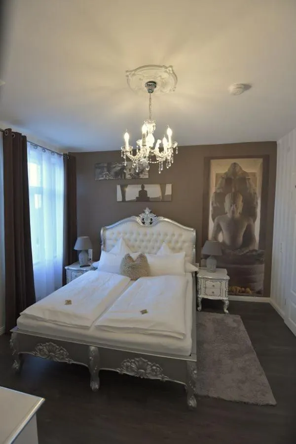 Photo of the whole room, Bed in Boutiquehotel Villa Rosenhof