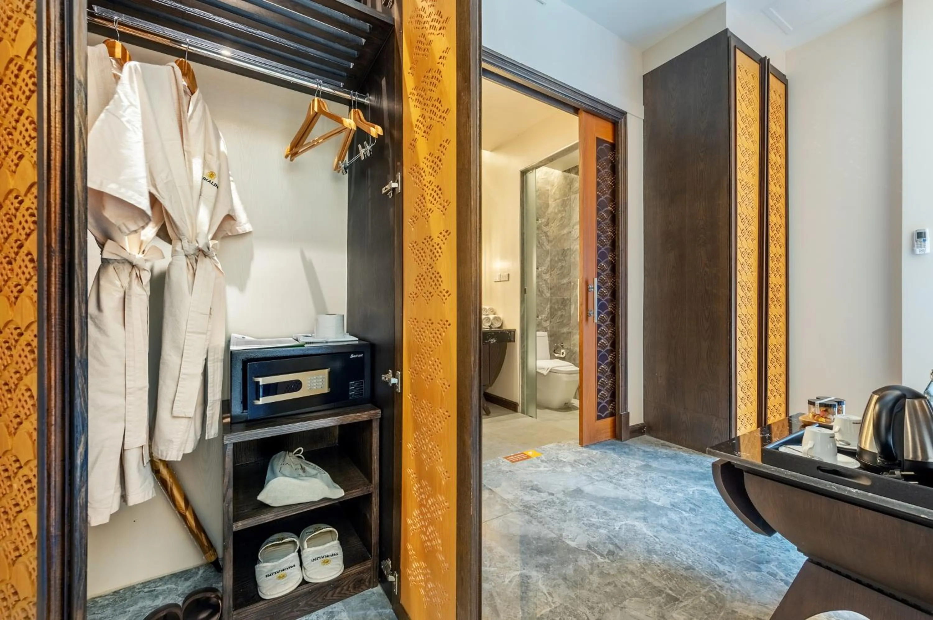 wardrobe in Phukalini Luxury Pool Villa & Onsen