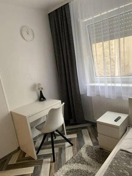 Seating area, Bed in Hostel Nürnberg