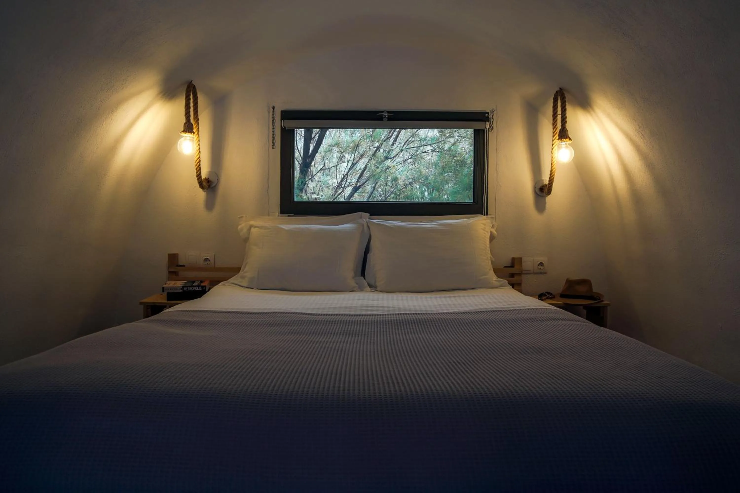 Bed in Exi Sea Side Suites