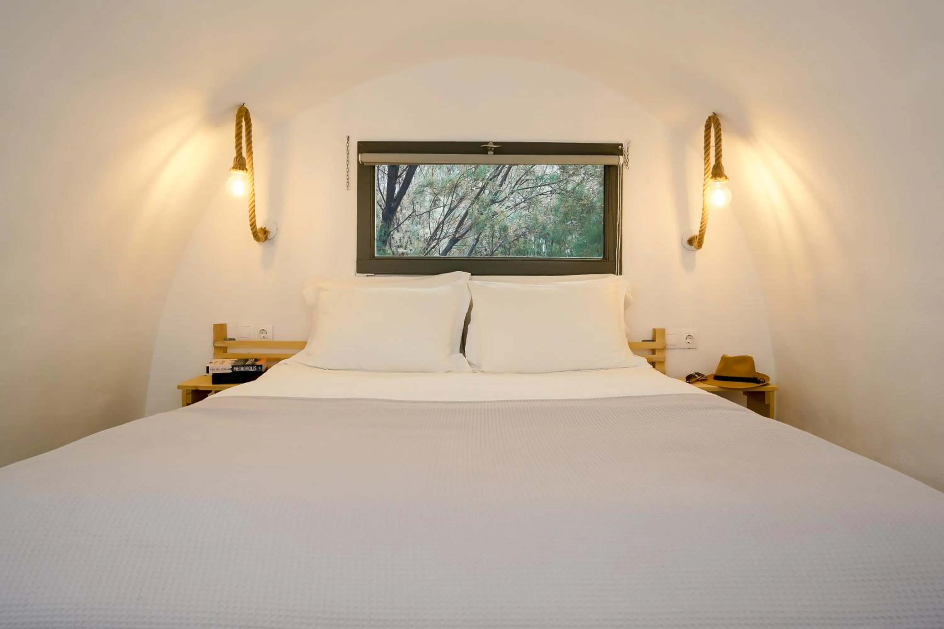 Bed in Exi Sea Side Suites