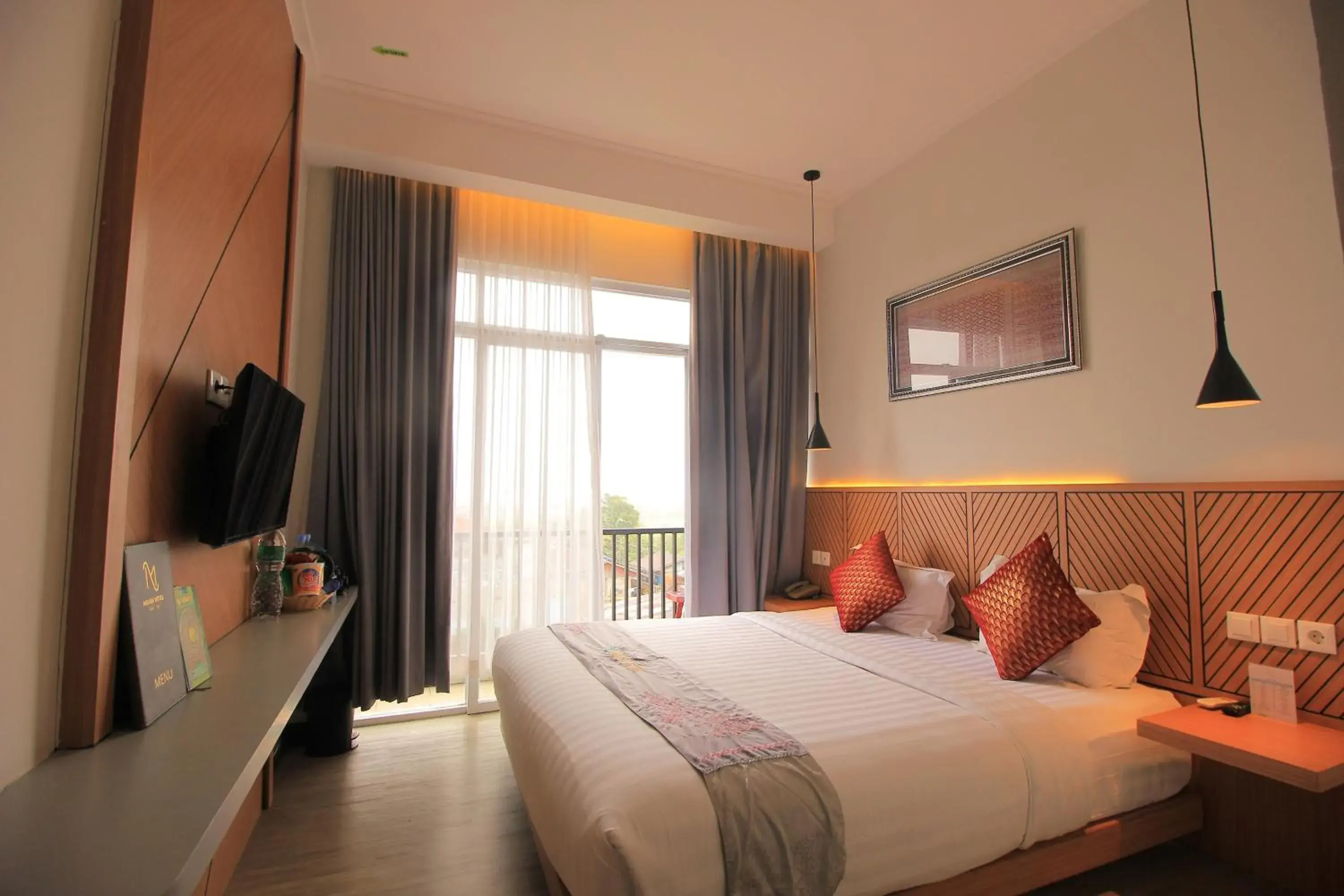 Deluxe Double Room with Balcony in Muara Hotel Bukittinggi Deluxe Double Room with Balcony in Muara Hotel Bukittinggi