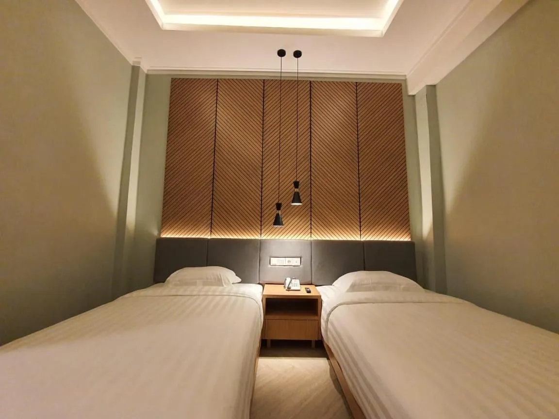 Bed in Muara Hotel Bukittinggi