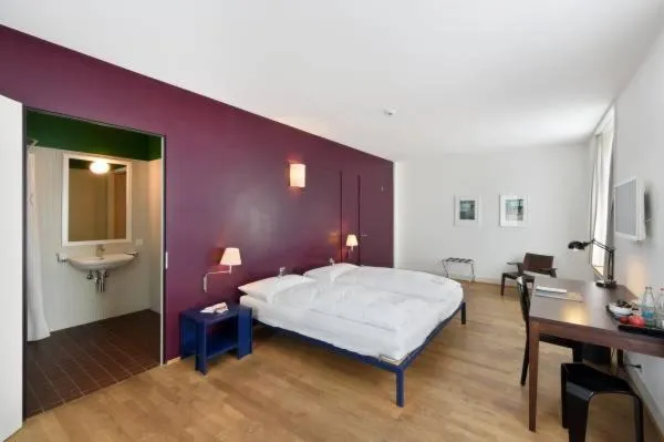 Bed in Hotel im Schlosspark