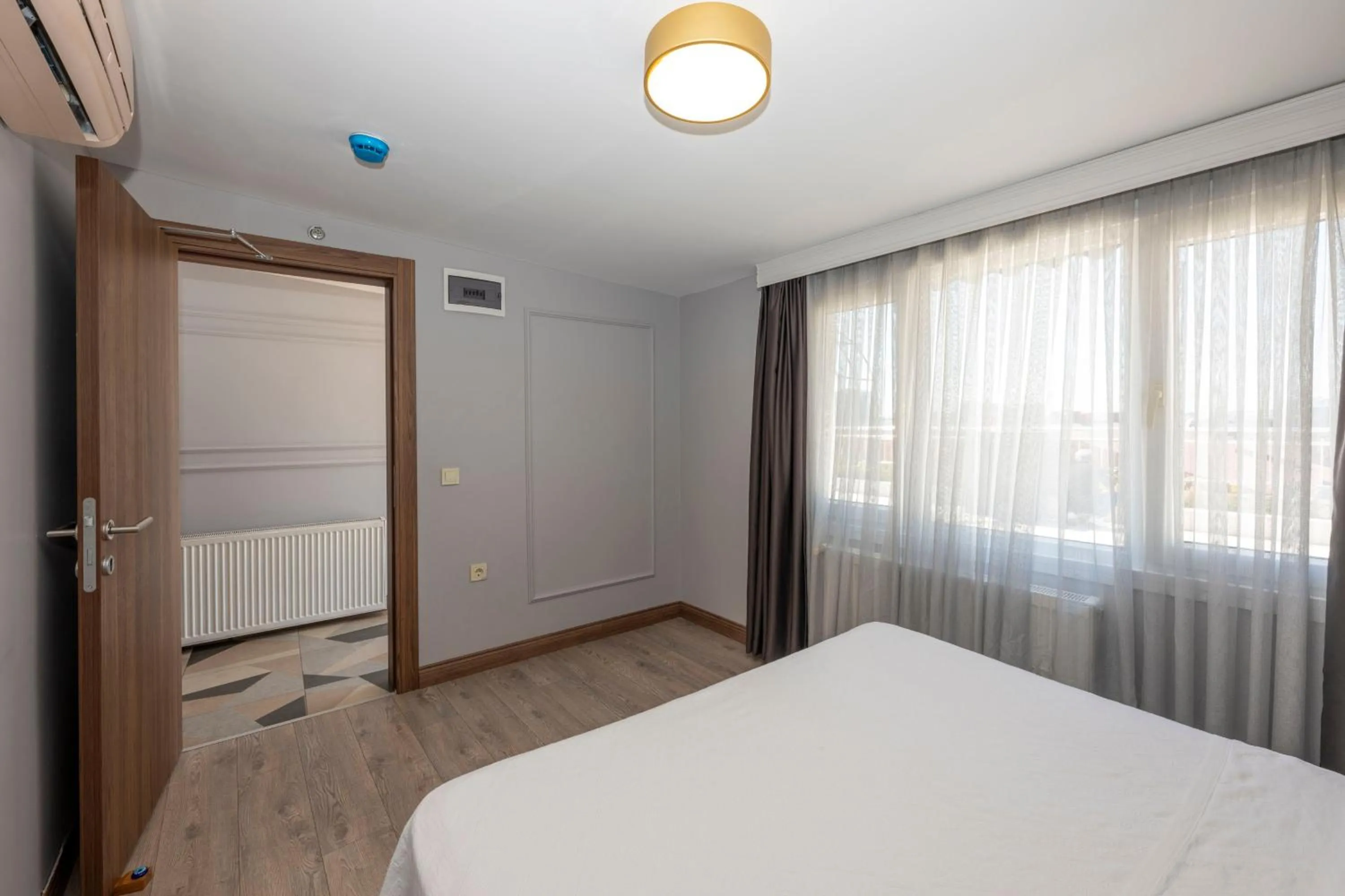 Bed in Comfort Suites Hotel