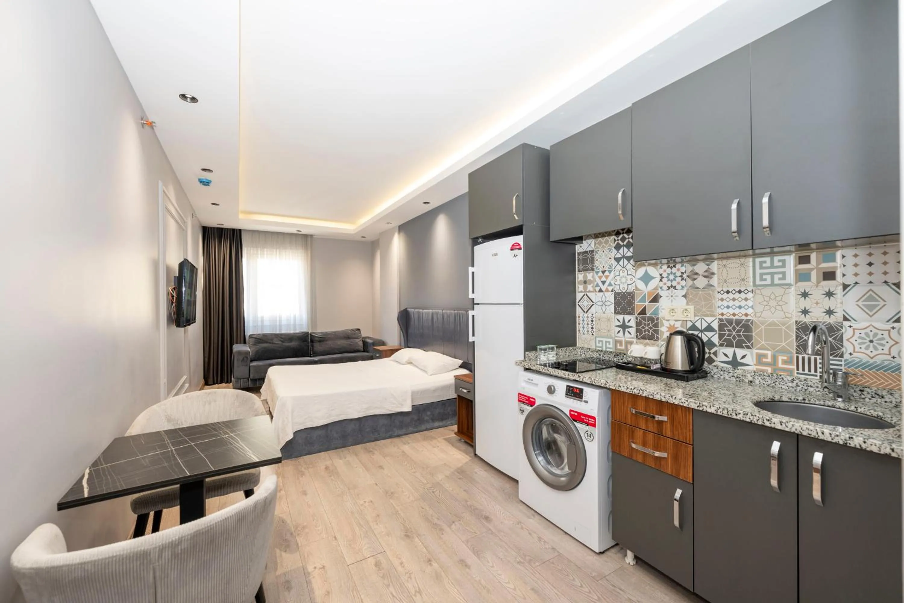 Bed in Comfort Suites Hotel