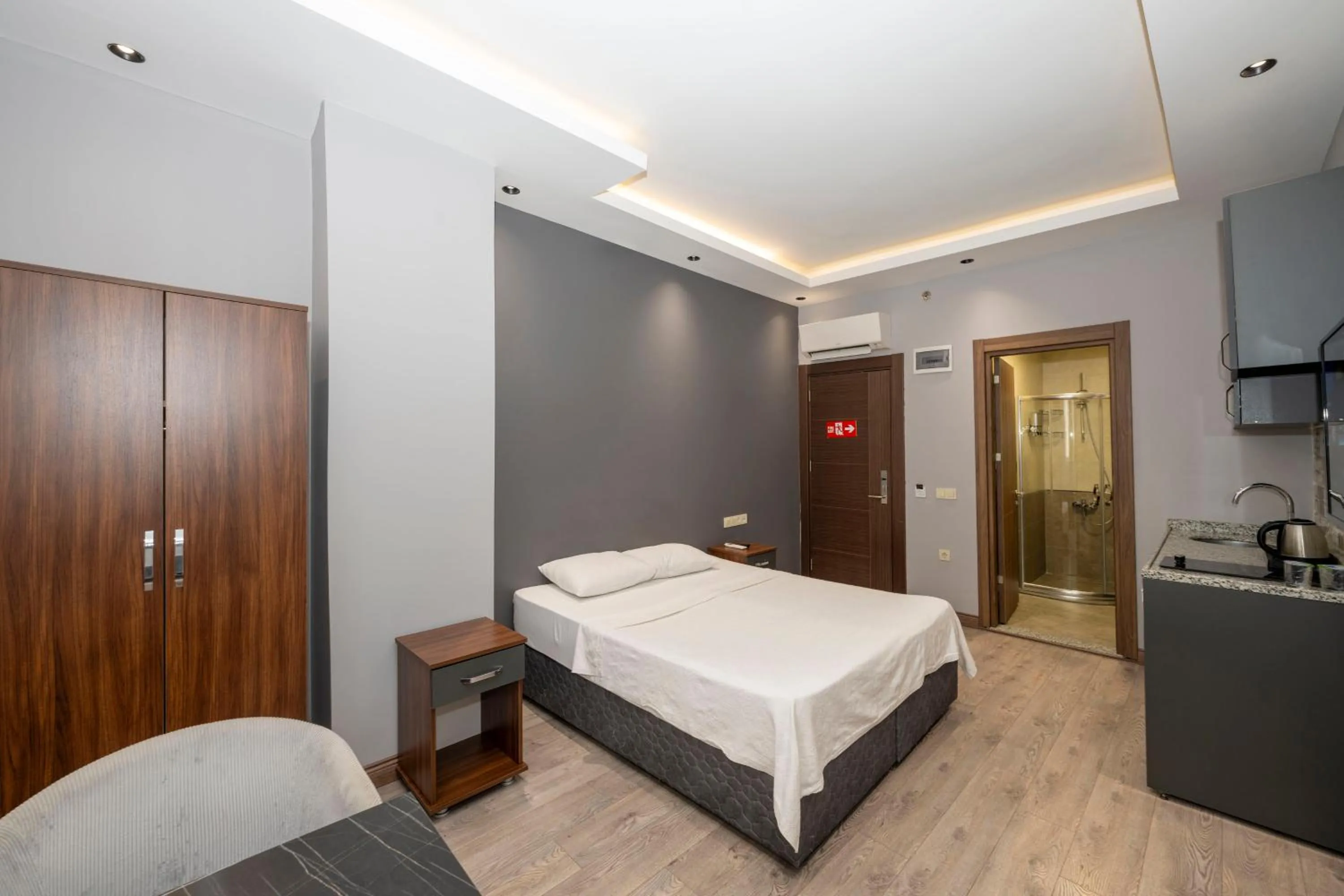 Bed in Comfort Suites Hotel