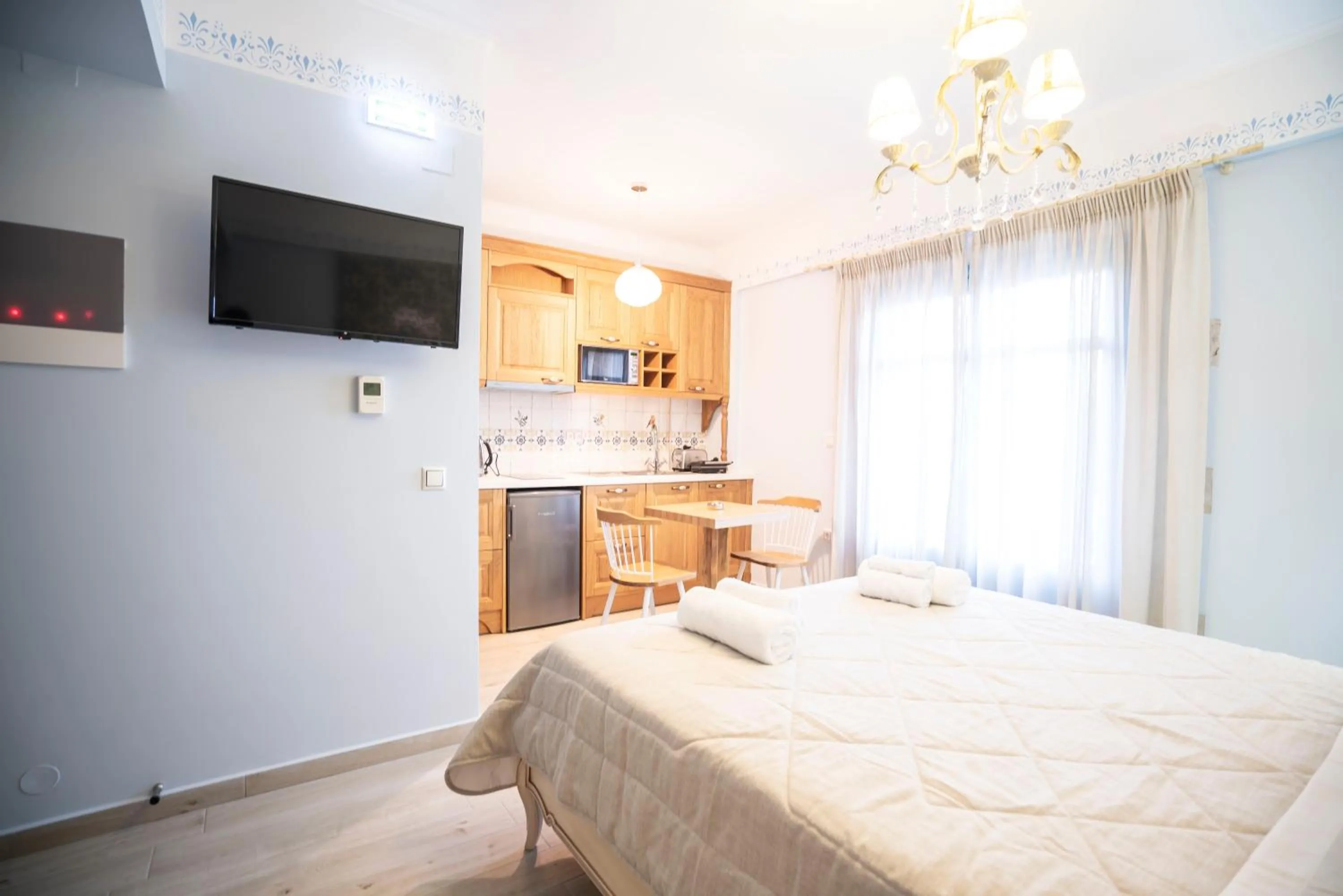 Photo of the whole room, Bed in Elysium Living Parga