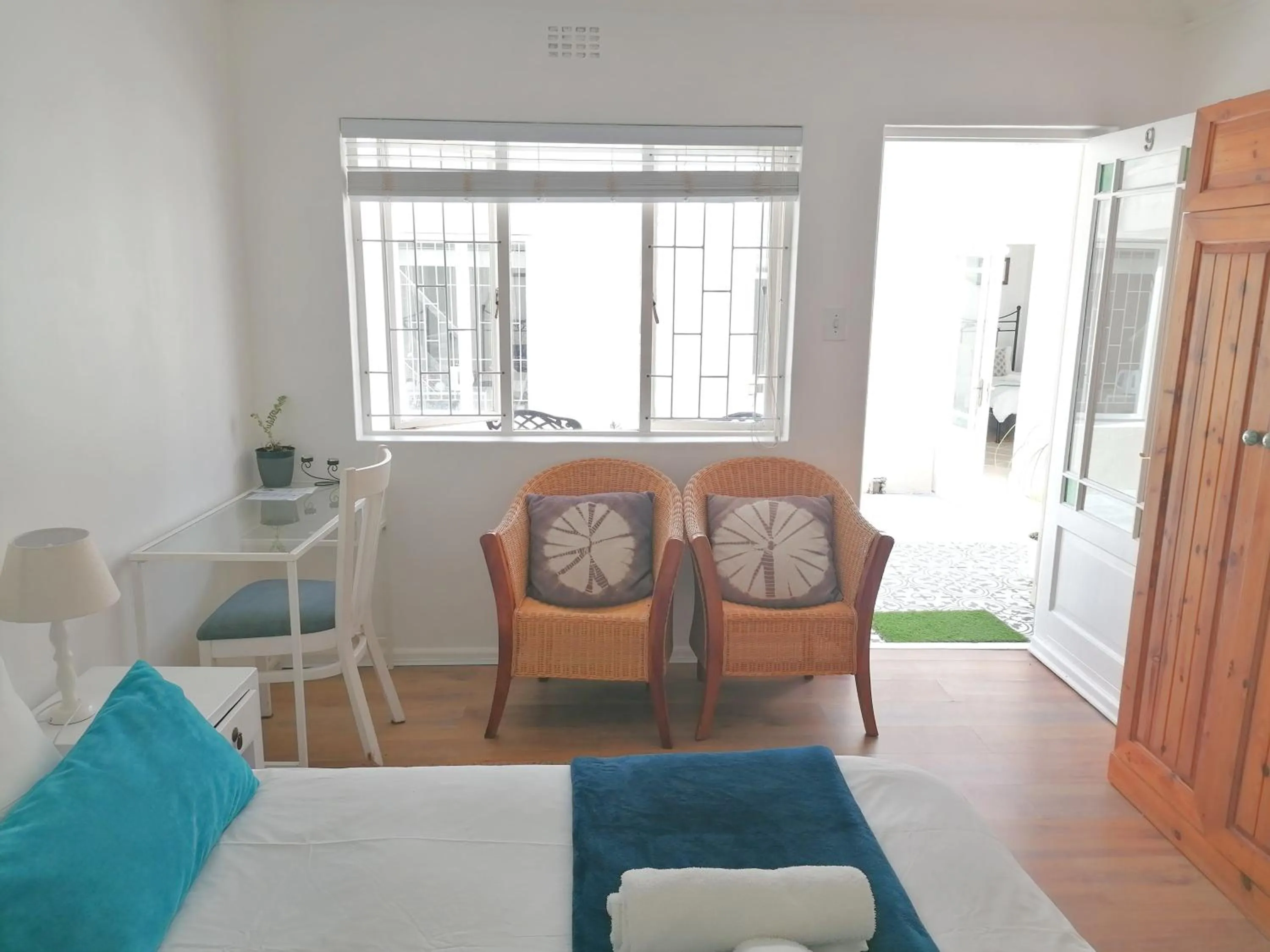 Bed in Boulders Beach Hotel, Cafe and Curio shop