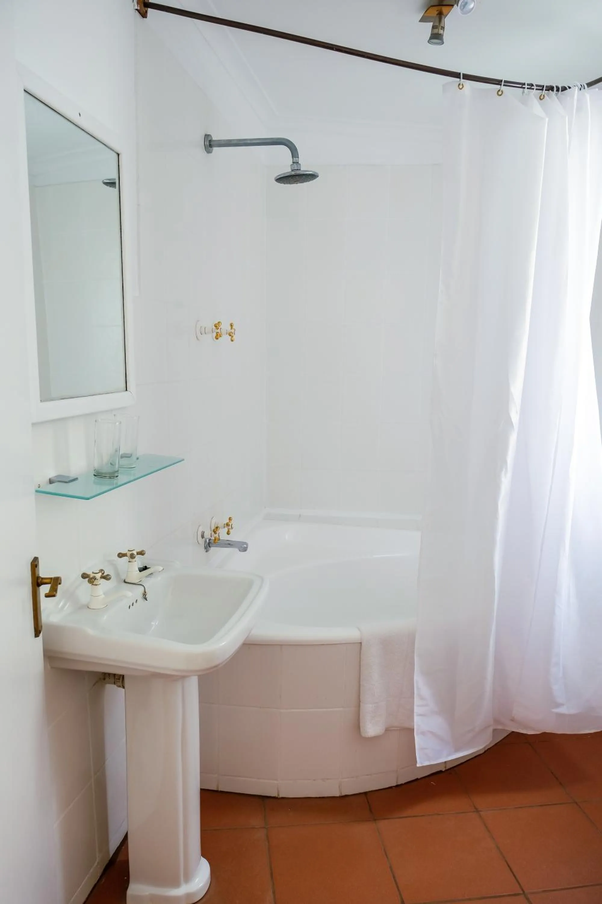 Shower in Boulders Beach Hotel, Cafe and Curio shop