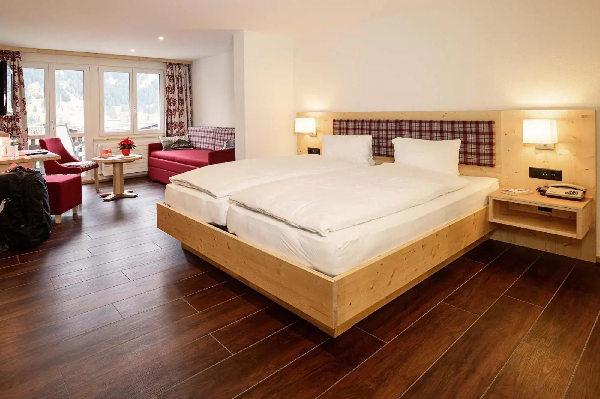 Superior Double Room with Eiger View in Hotel Caprice - Grindelwald Superior Double Room with Eiger View in Hotel Caprice - Grindelwald