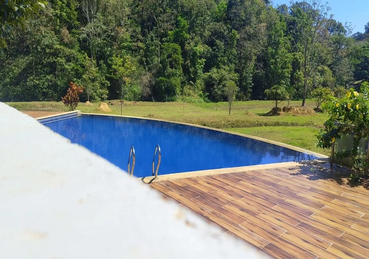 Swimming pool in Three Hills Resort Coorg