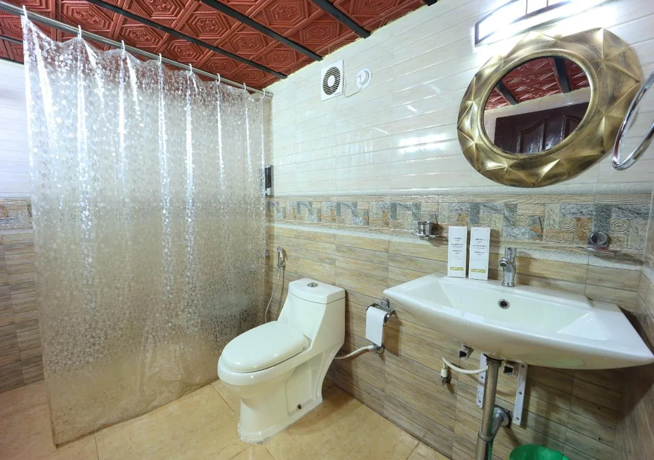 Bathroom in Three Hills Resort Coorg