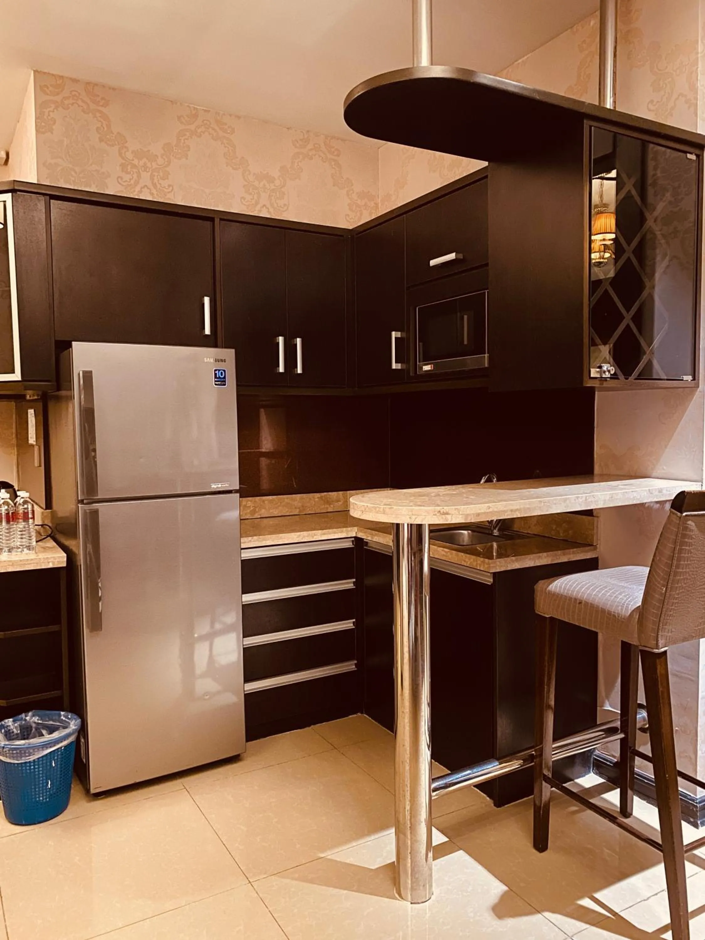 Kitchen or kitchenette in Prime Asia Hotel